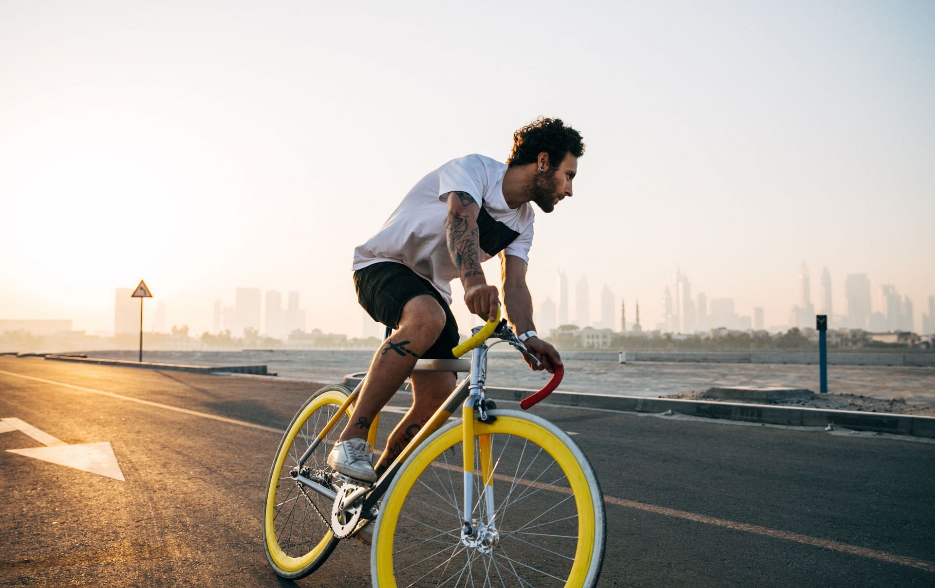 Cycling is also a great HIIT workout. (Image via Unsplash Jonny Kennaugh)