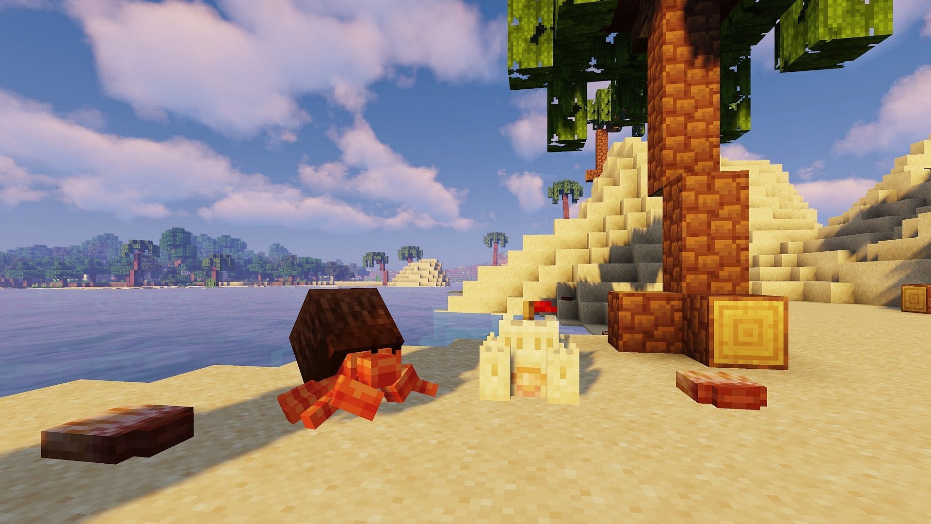 A coconut crab rests near a sand castle in Ecologics (Image via SameDifferent/CurseForge)