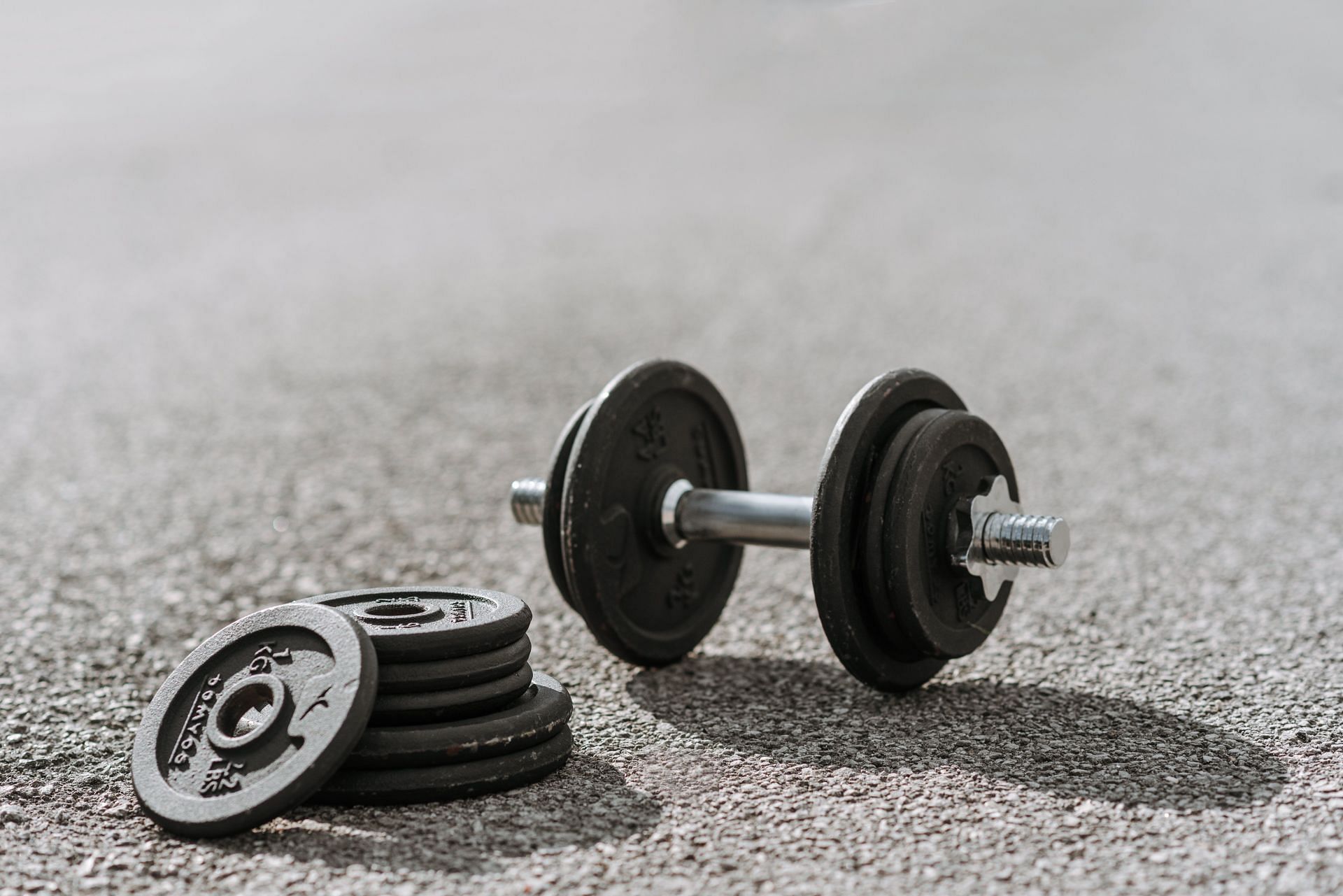 Dumbbells are a versatile and cost-effective option for weightlifting equipment at home (Photo by Anete Lusina/Pexels)