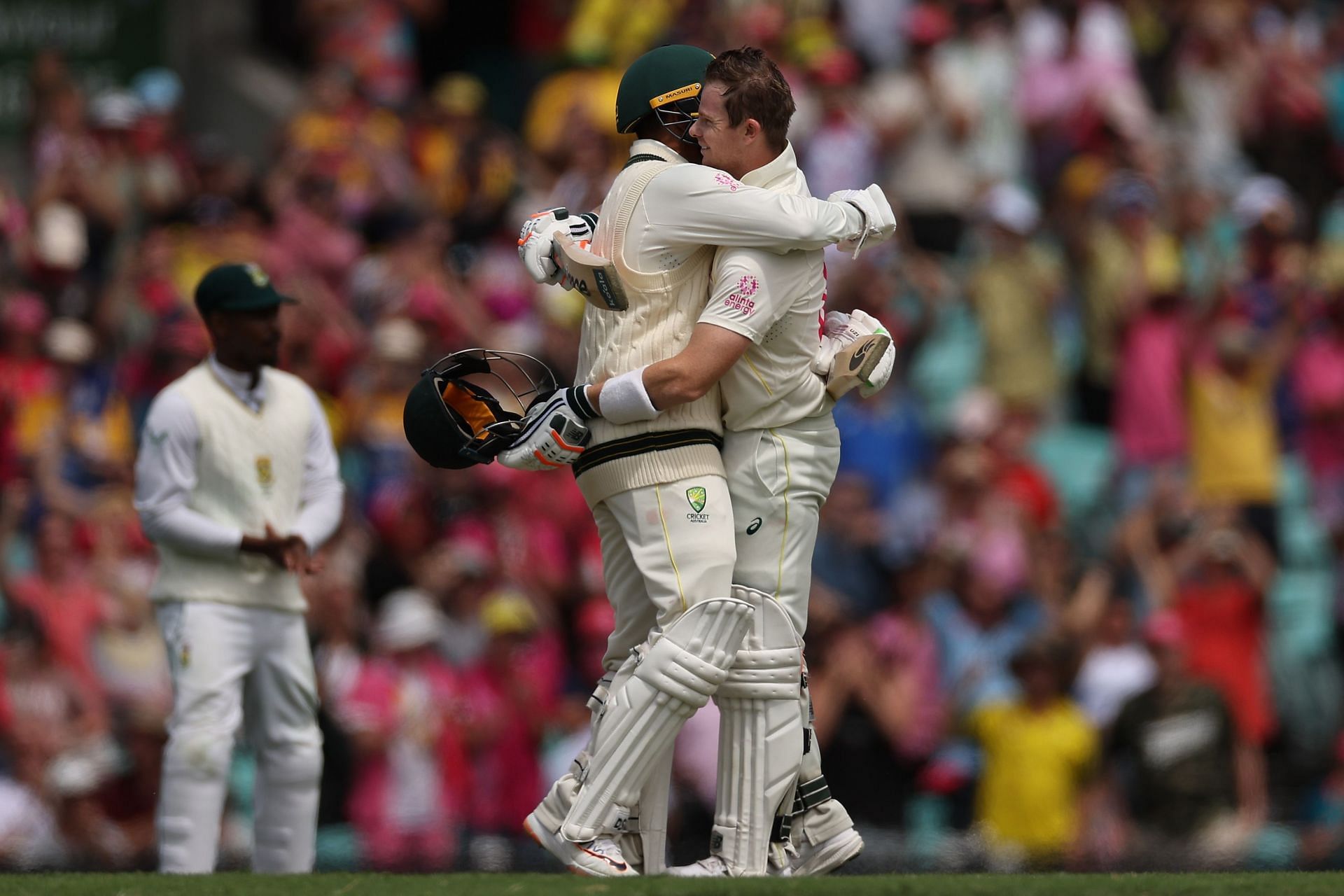 Steve Smith celebrates his century with Usman Khawaja during day two of the SCG Test. Pic: Getty Images