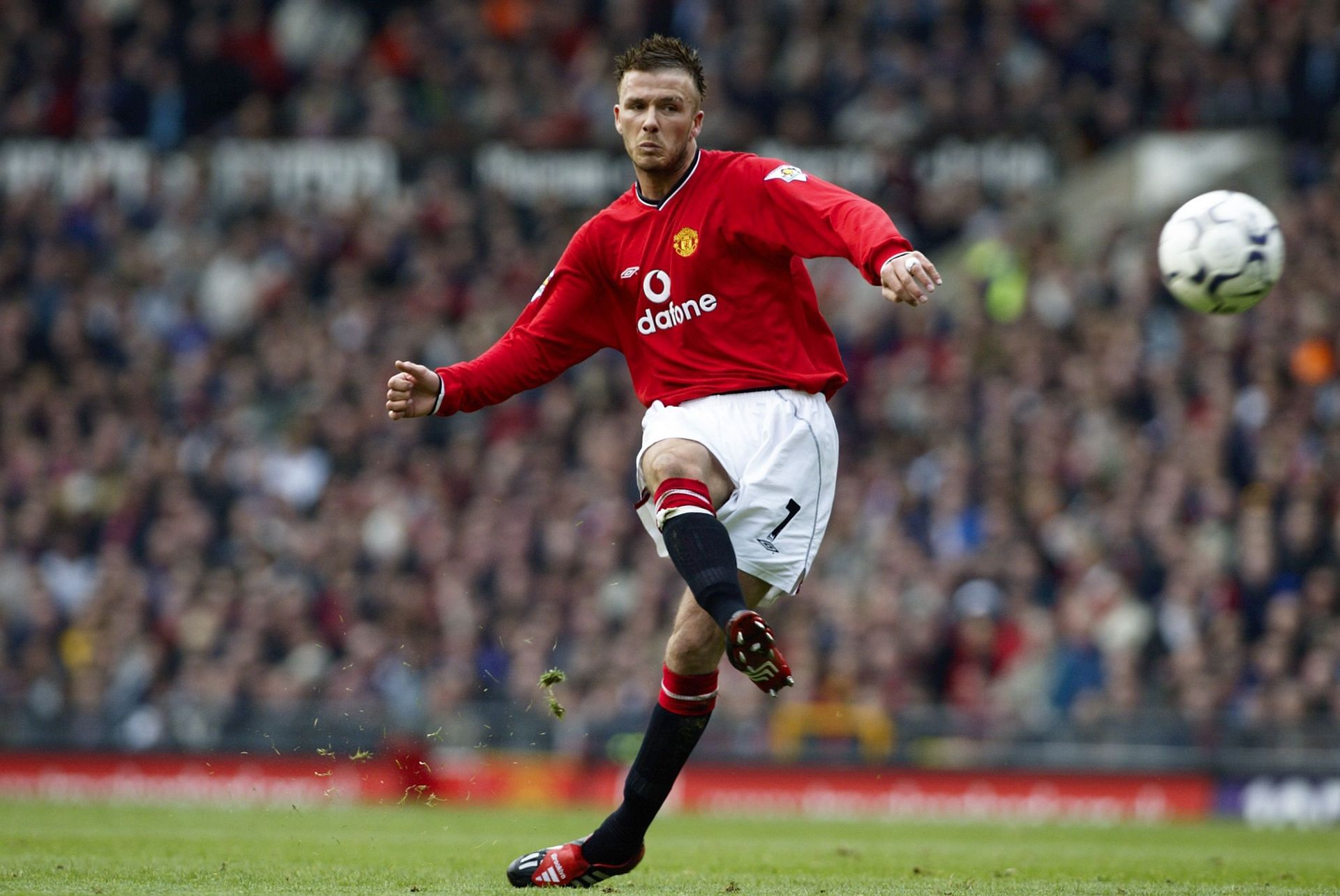 David Beckham takes a free-kick during his time with Manchester United