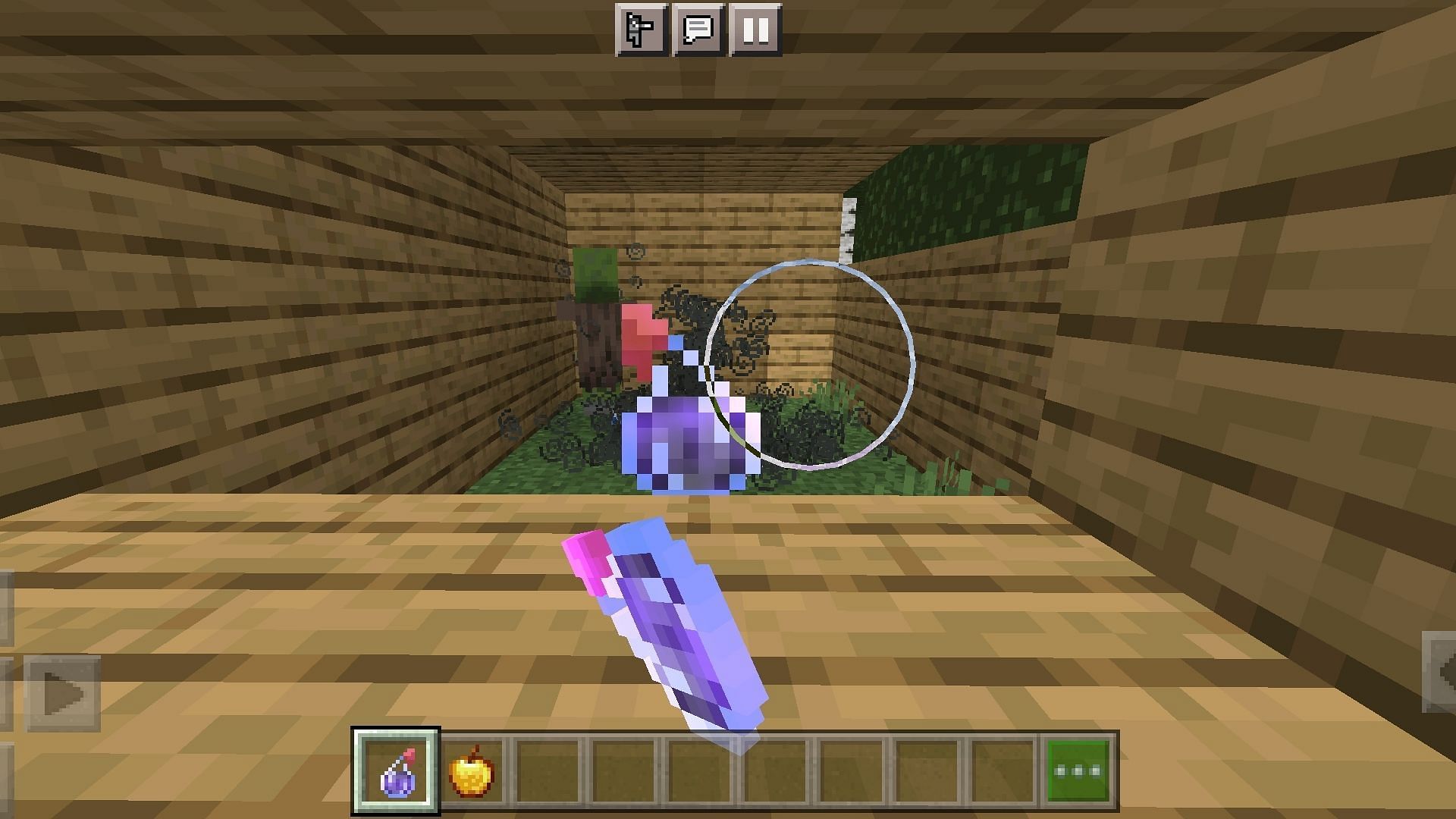 Throw a splash potion of weakness onto the mob to start the curing process in Minecraft PE (Image via Mojang)