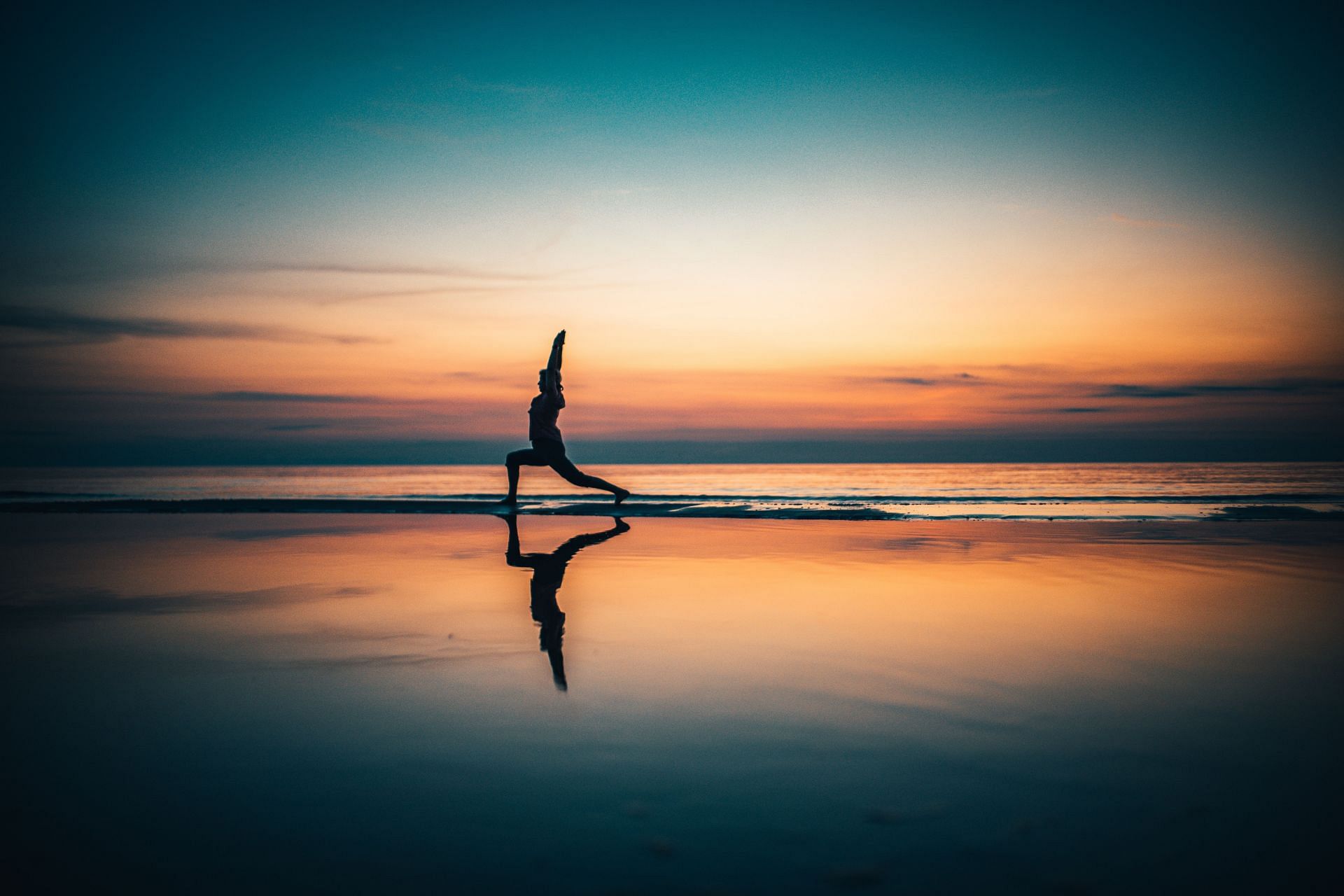 Gently stretch the entire spine. (Image via Unsplash / Raimond Klavins)