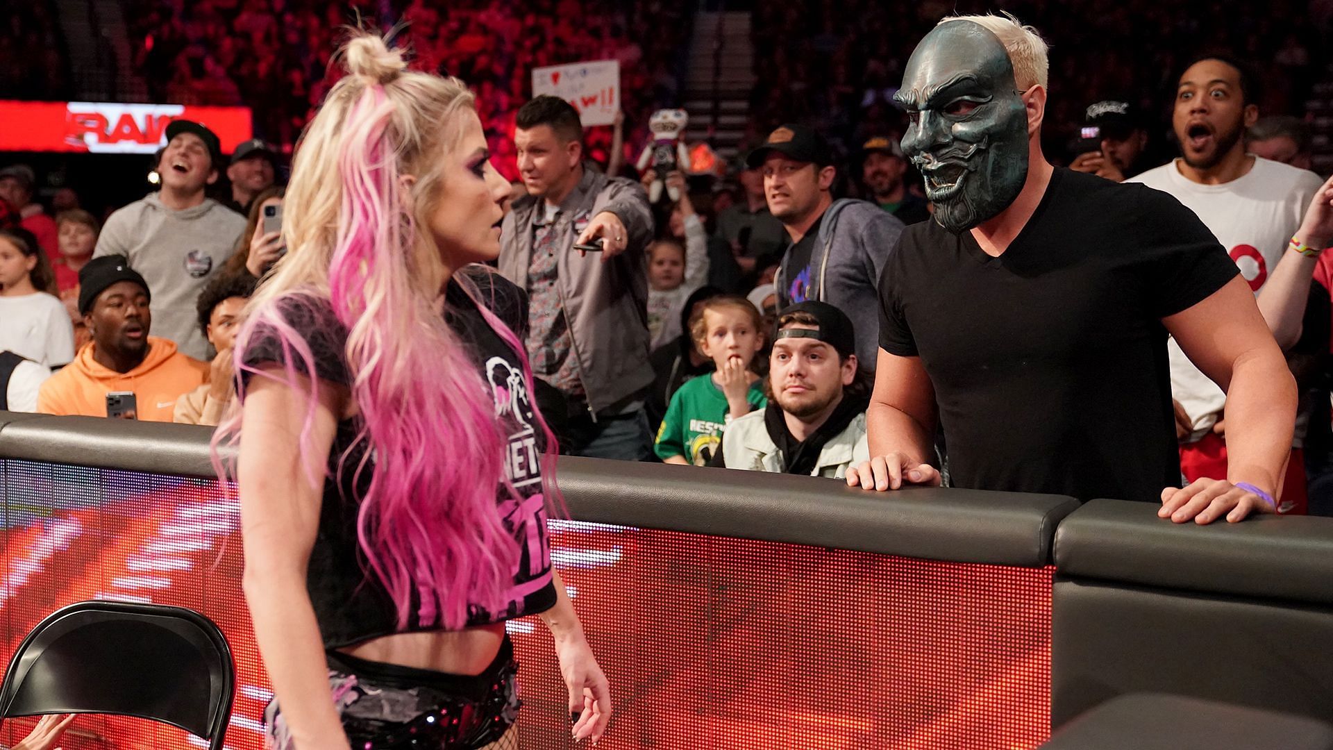 Alexa Bliss and an Uncle Howdy mask