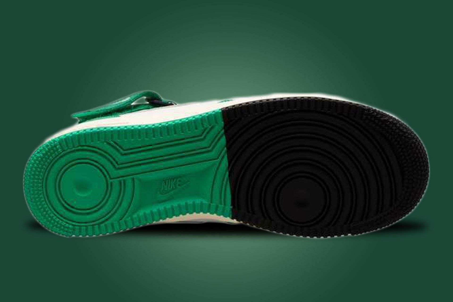 The outsoles of these sneakers are also completed in matching split patterns (Image via Nike)