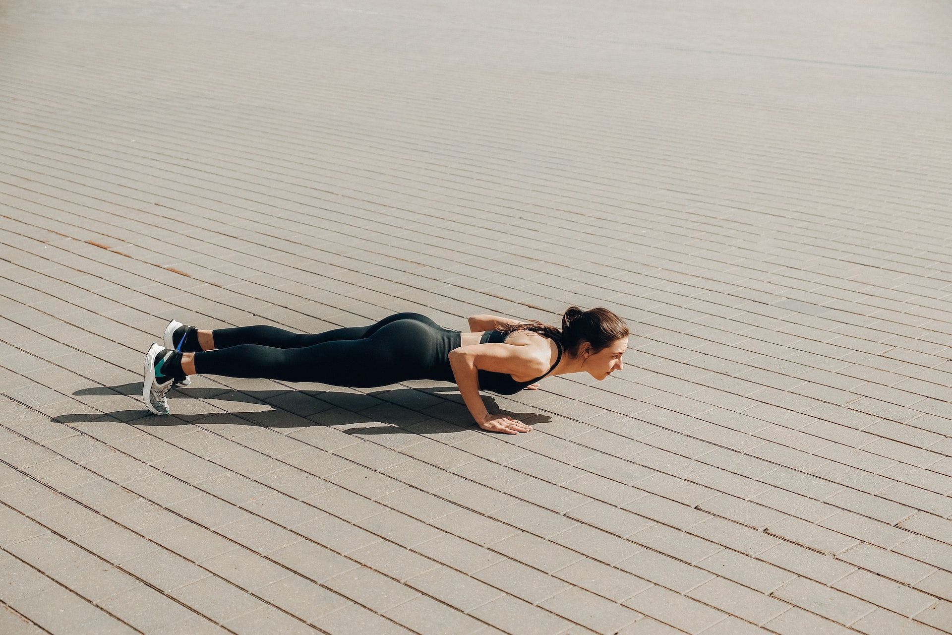 Glute workouts for women help build stronger lower body. (Photo via Pexels/Maksim Goncharenok)