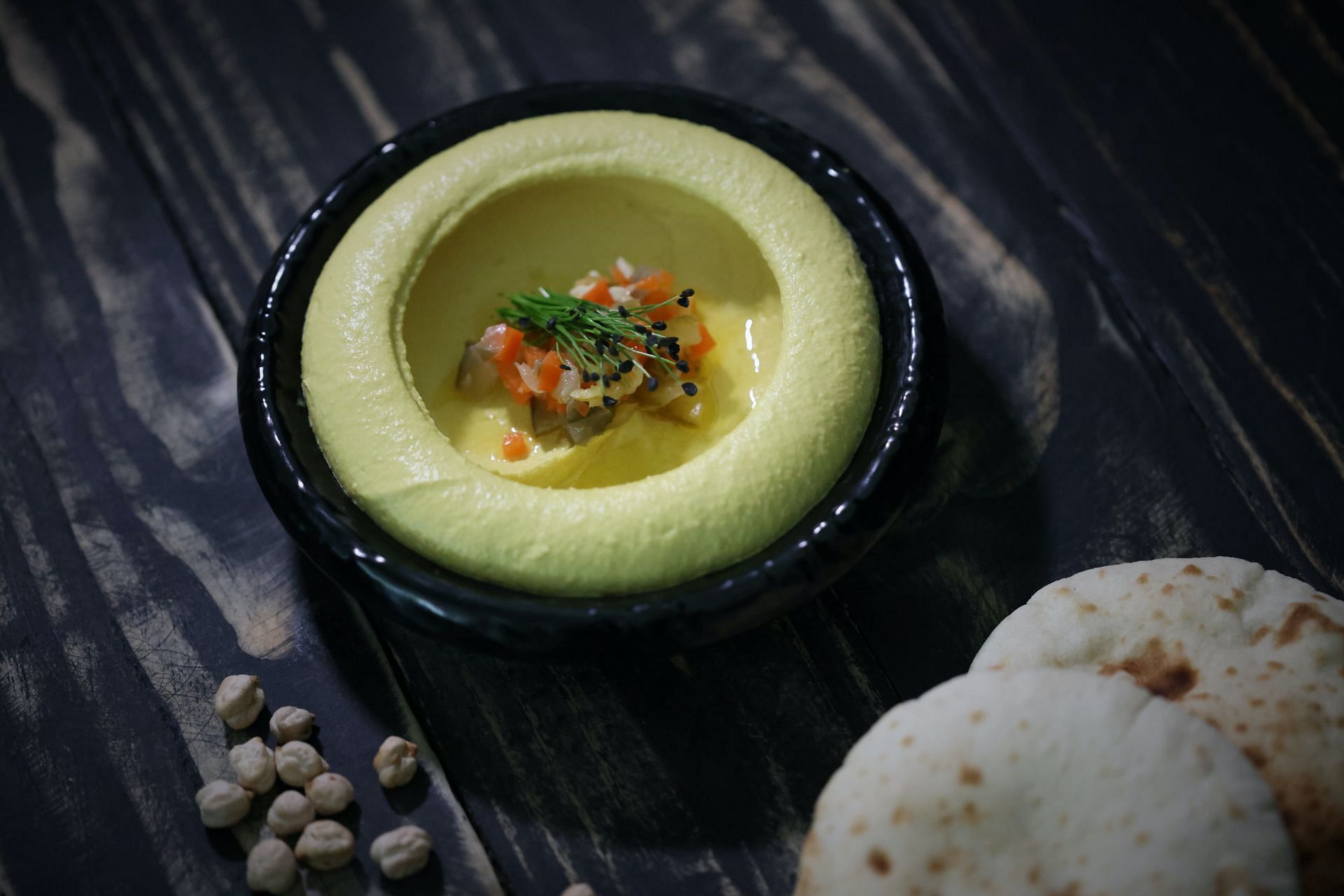 You can customize your hummus as you wish by adding different flavors i.e. avocado hummus.(Image via Pexels/Shameel Mukkath)