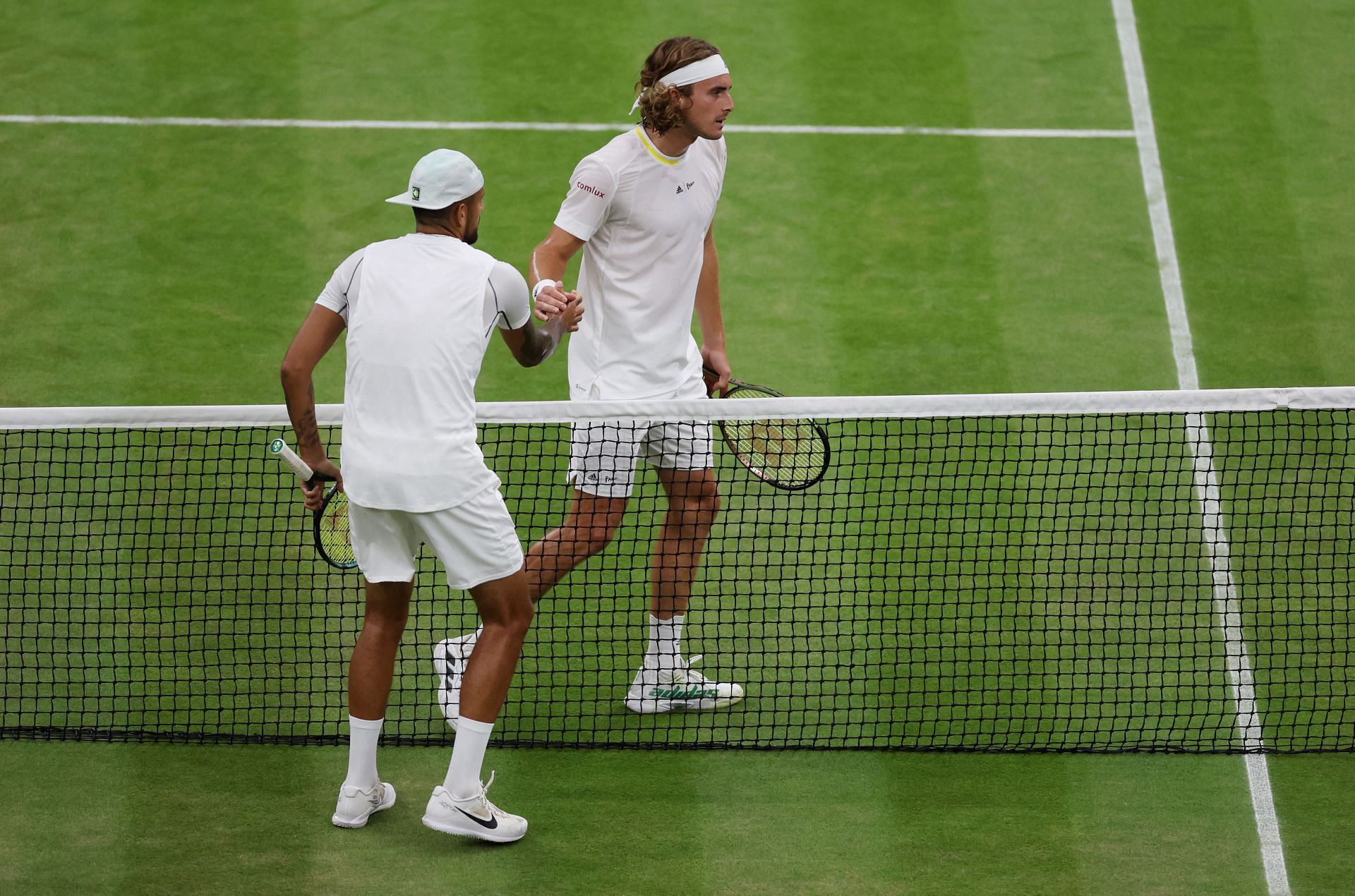 Nick Kyrgios (L) and Stefanos Tsitsipas