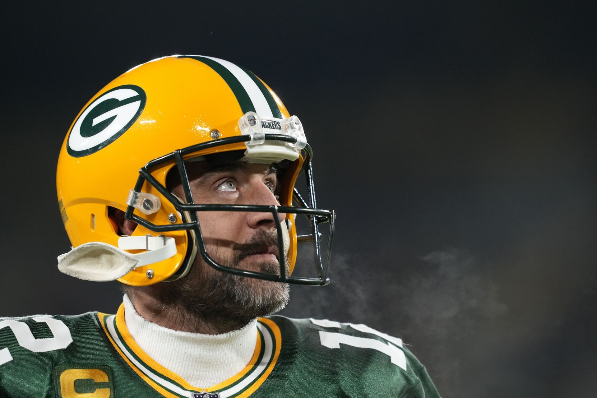 Rodgers looks on at Lambeau Field