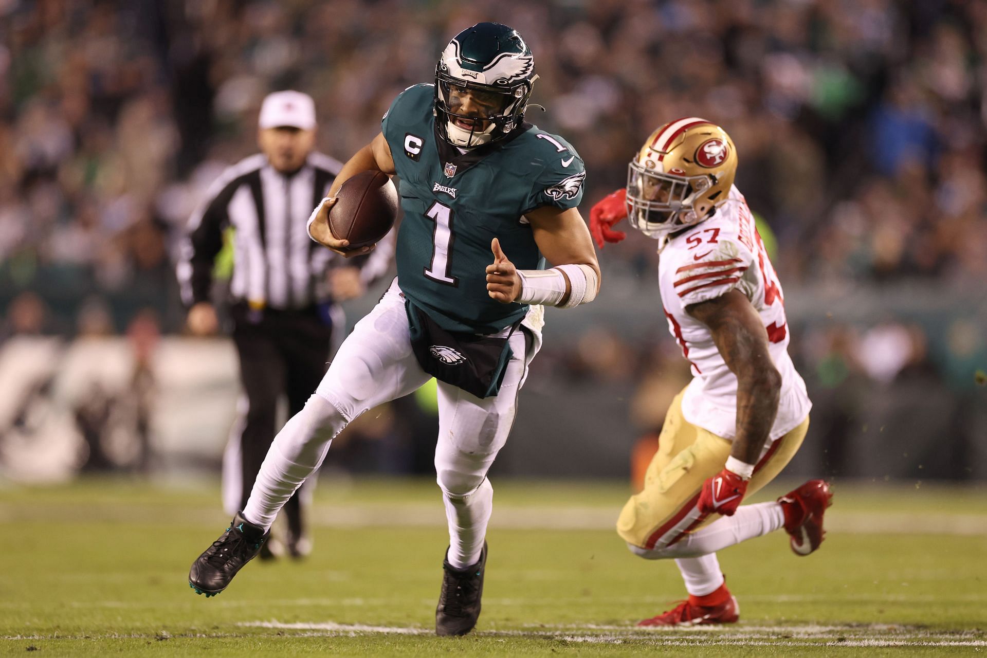 Jalen Hurts of the Philadelphia Eagles runs the ball against the San Francisco 49ers in the NFC Championship Game