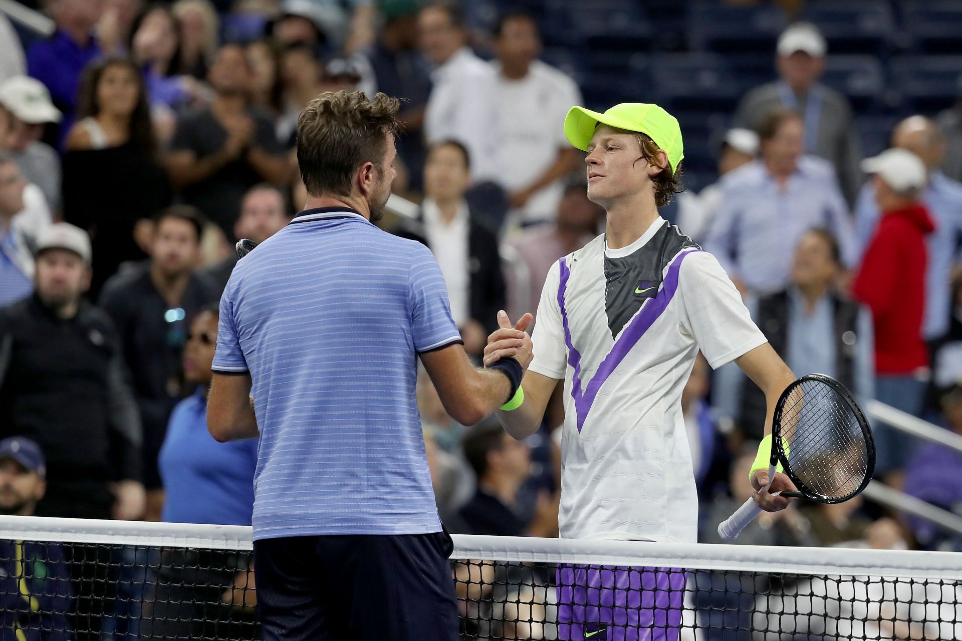 Stan Wawrinka (L) and Jannik Sinner