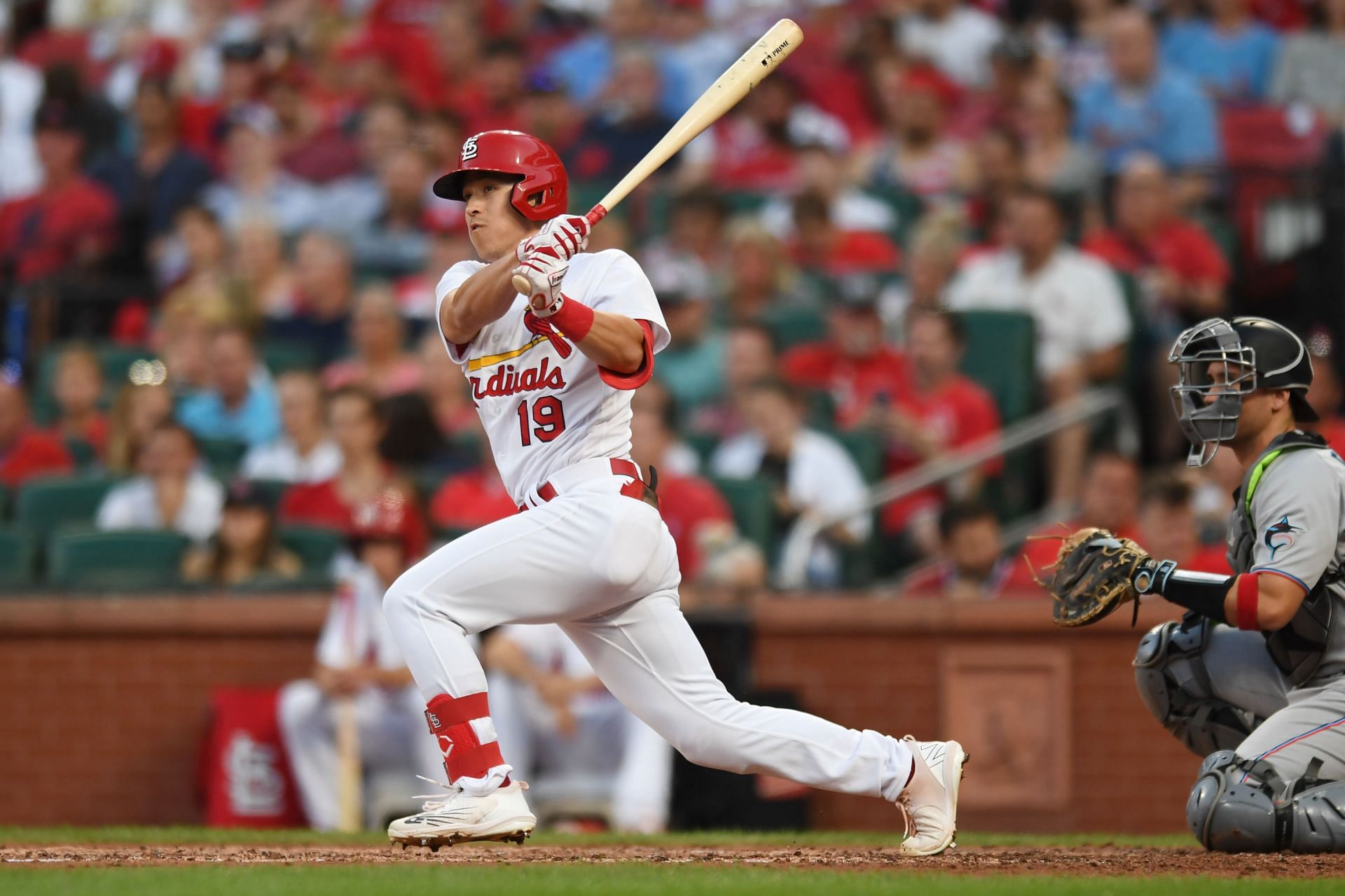 Tommy Edman hits a double in the fourth inning against the Miami Marlins at Busch Stadium