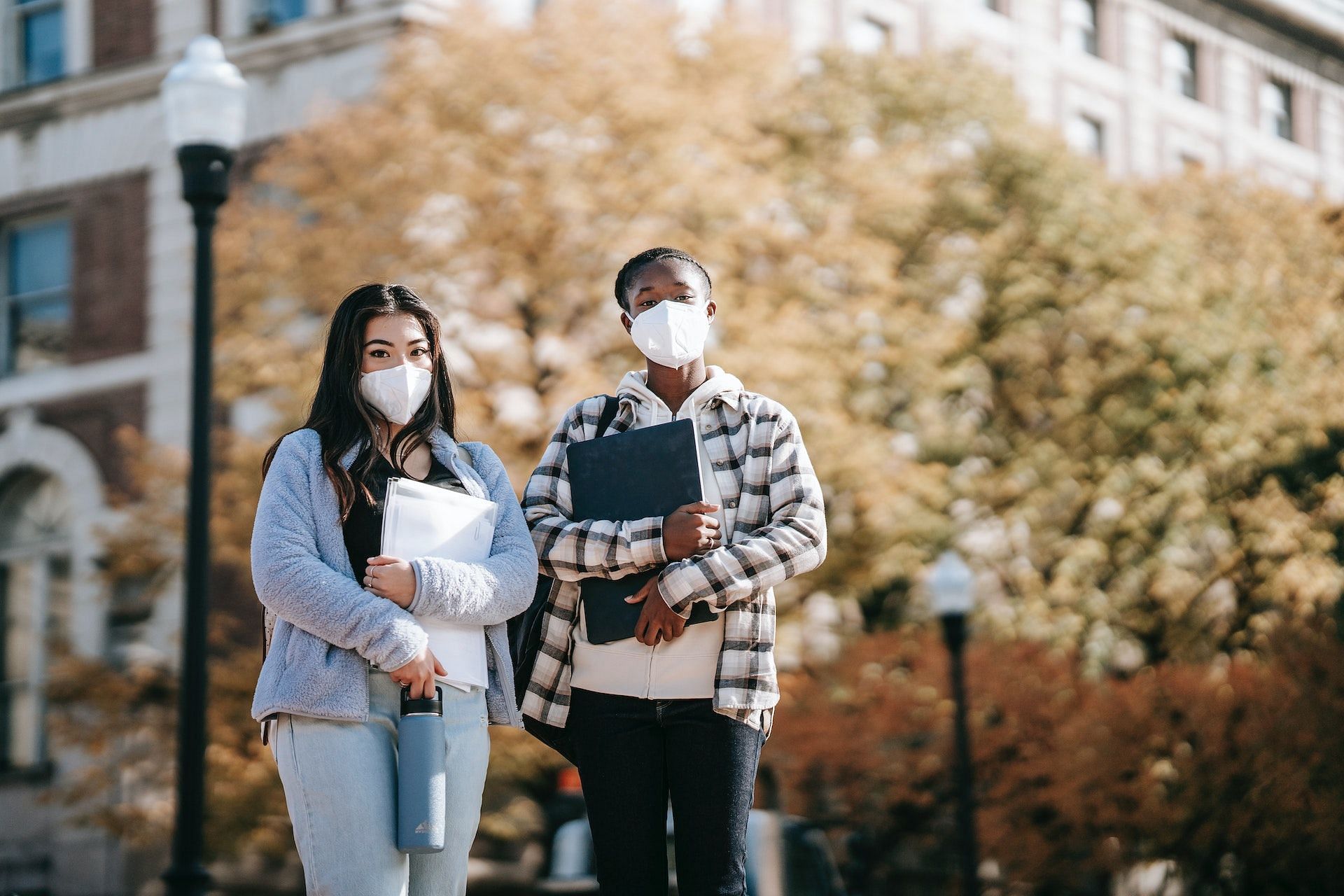 Always wear a mask when outdoors. (Photo via Pexels/Charlotte May)