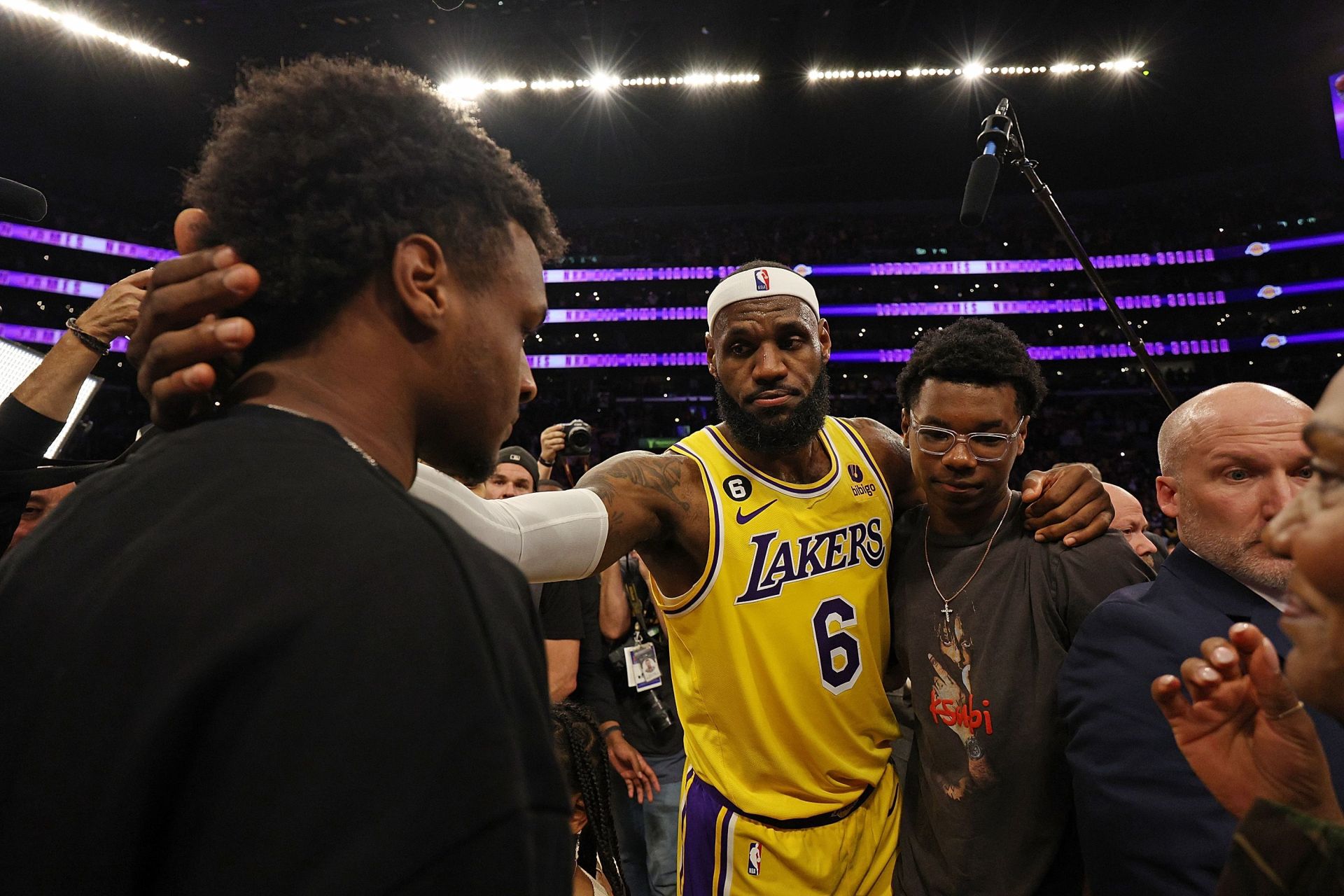 LeBron James with his sons Bronny and Bryce (right).