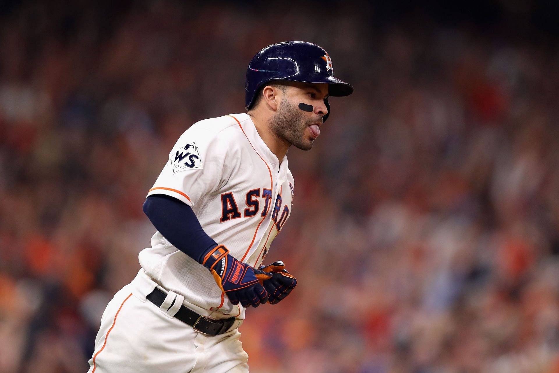 Jose Altuve of the Houston Astros reacts after hitting a three-run home run during the fifth inning against the Los Angeles Dodgers in game five of the 2017 World Series at Minute Maid Park on October 29, 2017, in Houston, Texas.