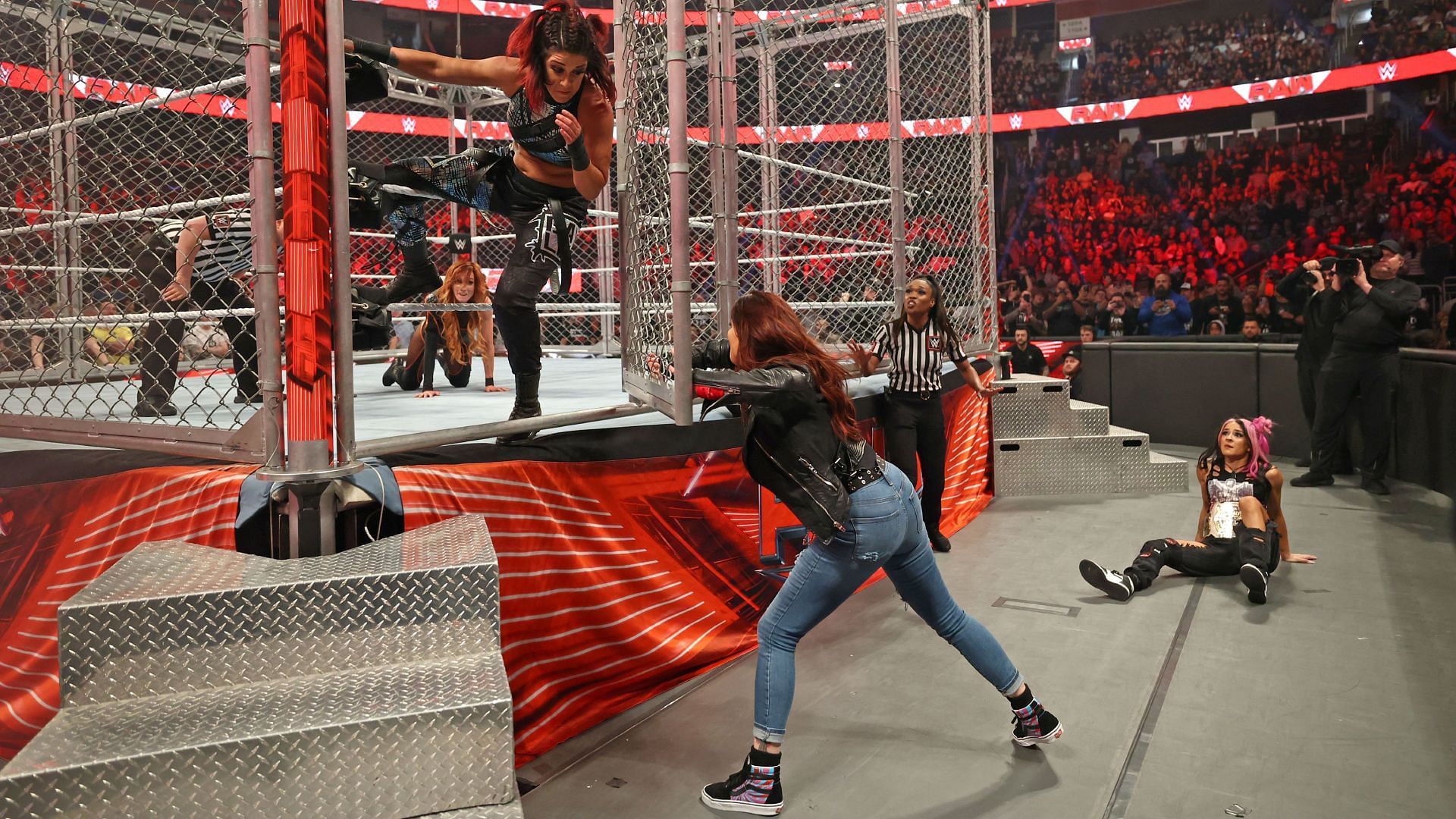 Lita saving Becky Lynch on RAW