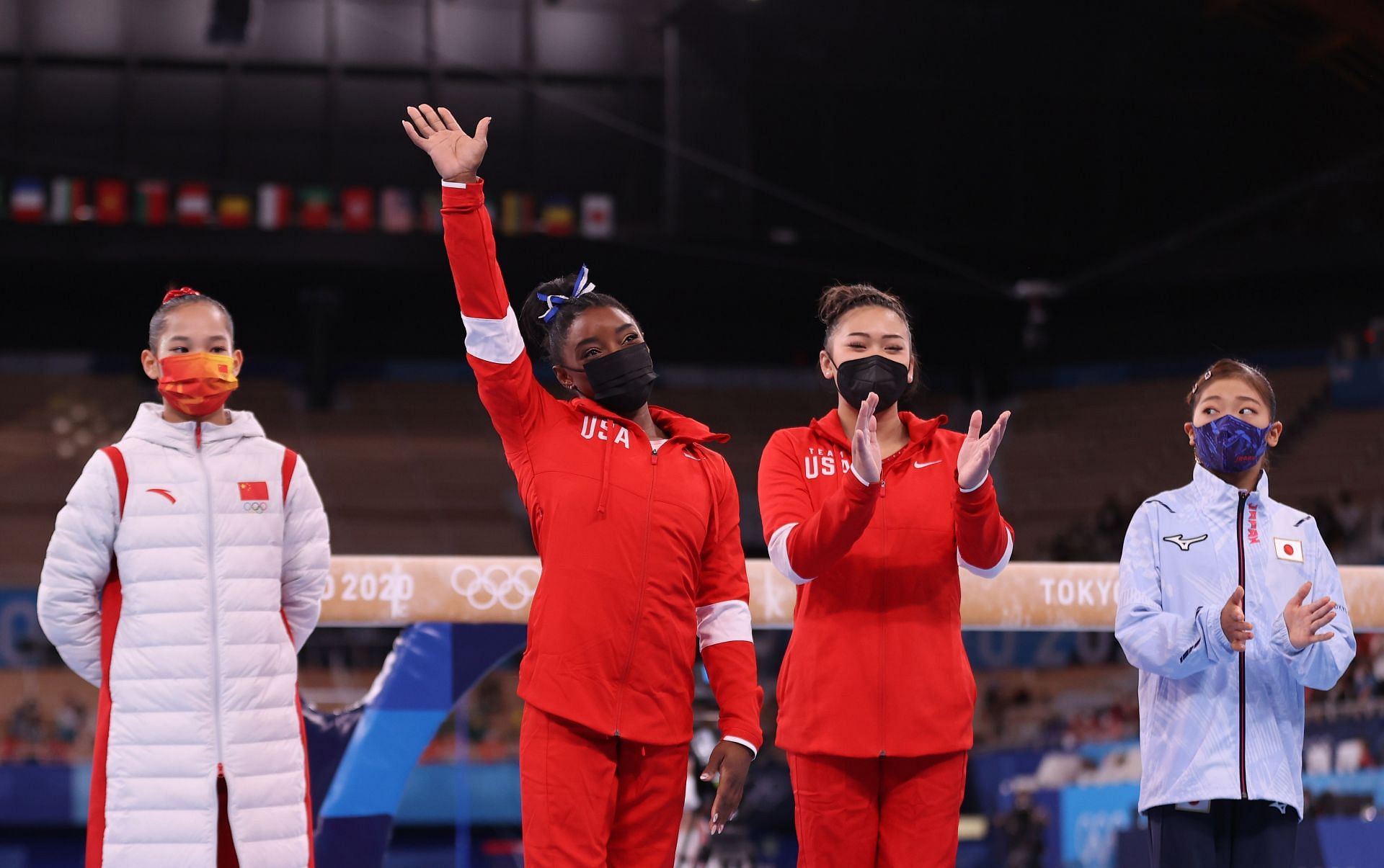 Simone Biles of Team United States acknowledges the crowd as Sunisa Lee looks on prior to Women&#039;s Balance Beam Final on day eleven of the Tokyo 2020 Olympic Games at Ariake Gymnastics Centre on August 03, 2021 in Tokyo, Japan. (Photo by Laurence Griffiths/Getty Images)