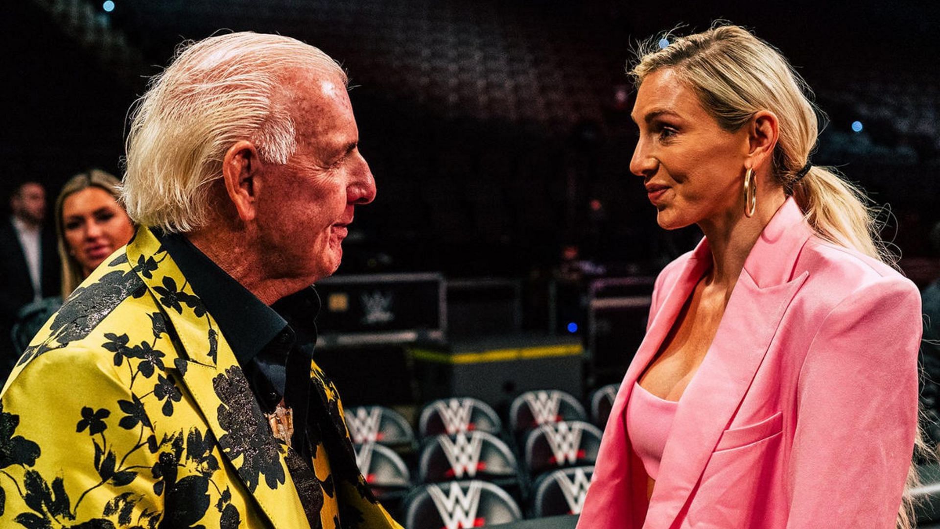 WWE Hall of Famer Ric Flair (left) and SmackDown Women
