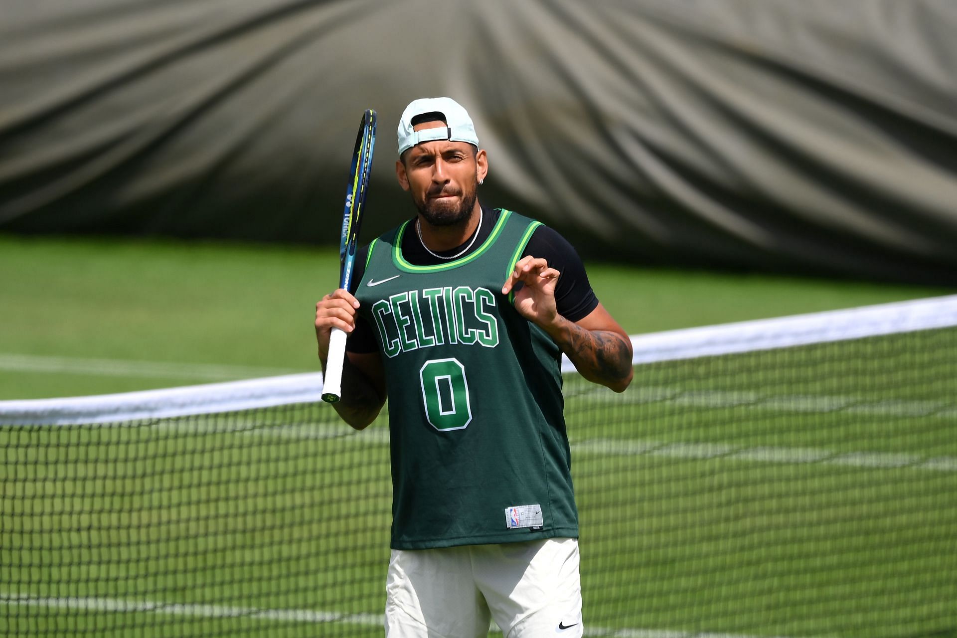 Nick Kyrgios wearing a Boston Celtics jersey at Wimbledon