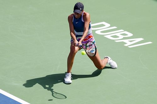 Madison Keys strikes the ball in Dubai