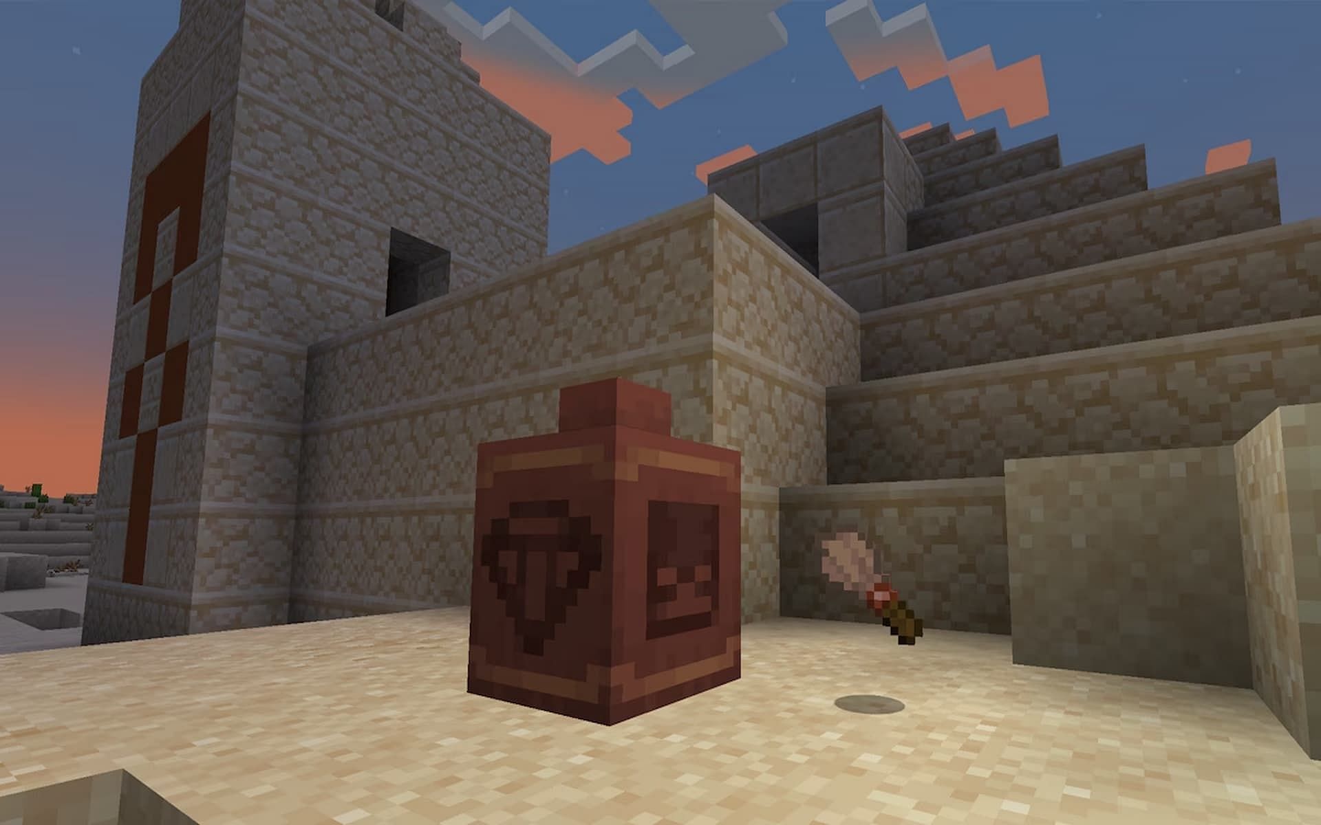 Players must use their new brush tool to uncover the mysteries of the suspicious sand (Image via Mojang)