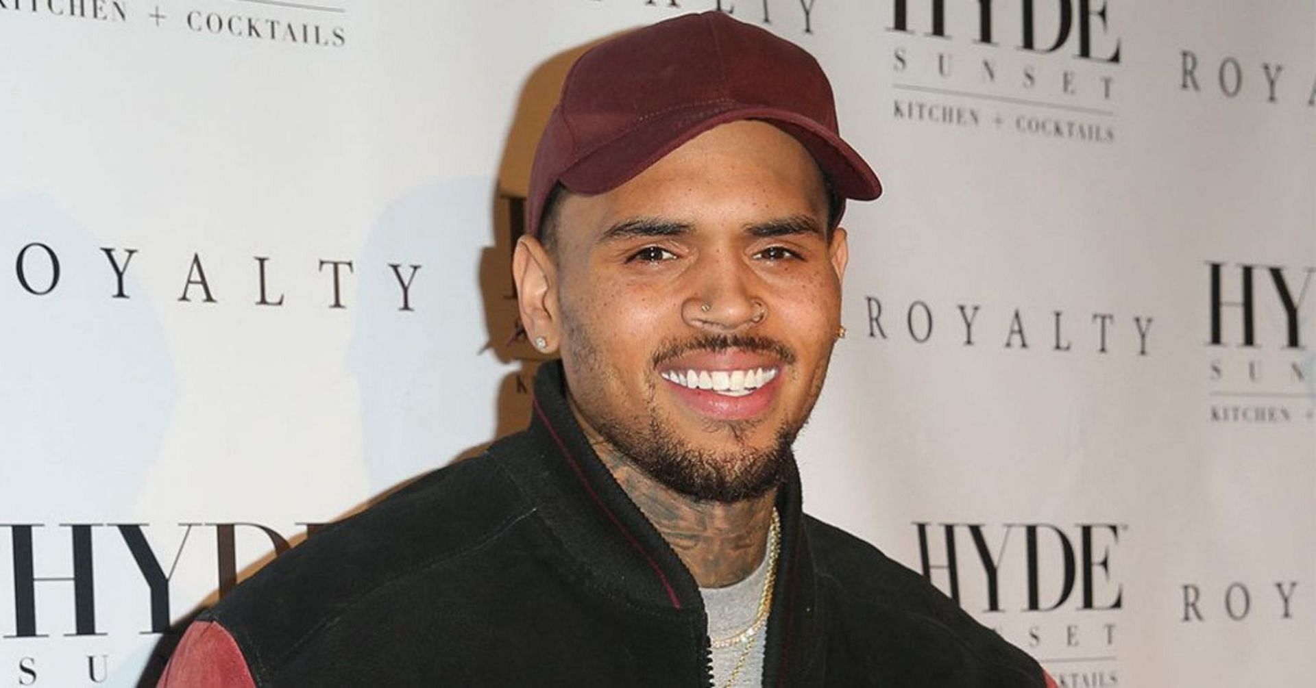 Chris Brown addresses hate he receives from assaulting Rihanna (Image via Getty Images)