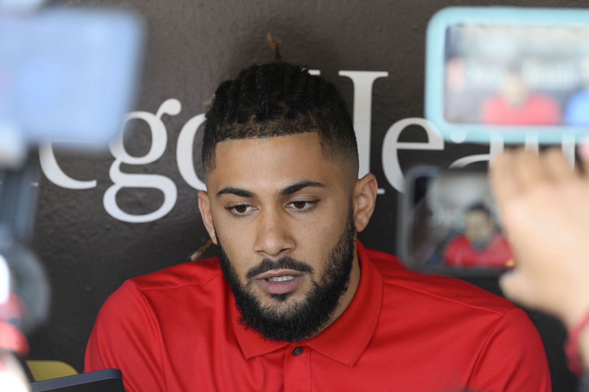 Fernando Tatis Jr. #23 of the San Diego Padres speaks at news conference before a game