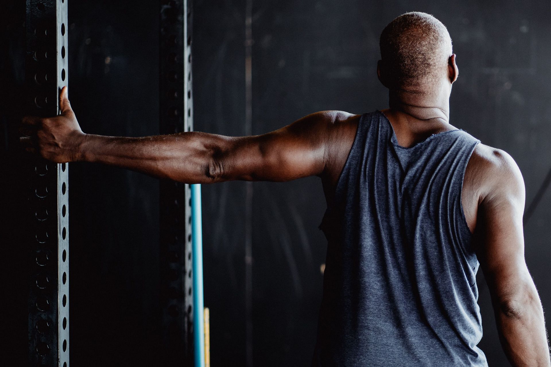 Rotator cuff stretches can help open up the shoulder muscles. (Image via Pexels / Ketut Subiyanto)