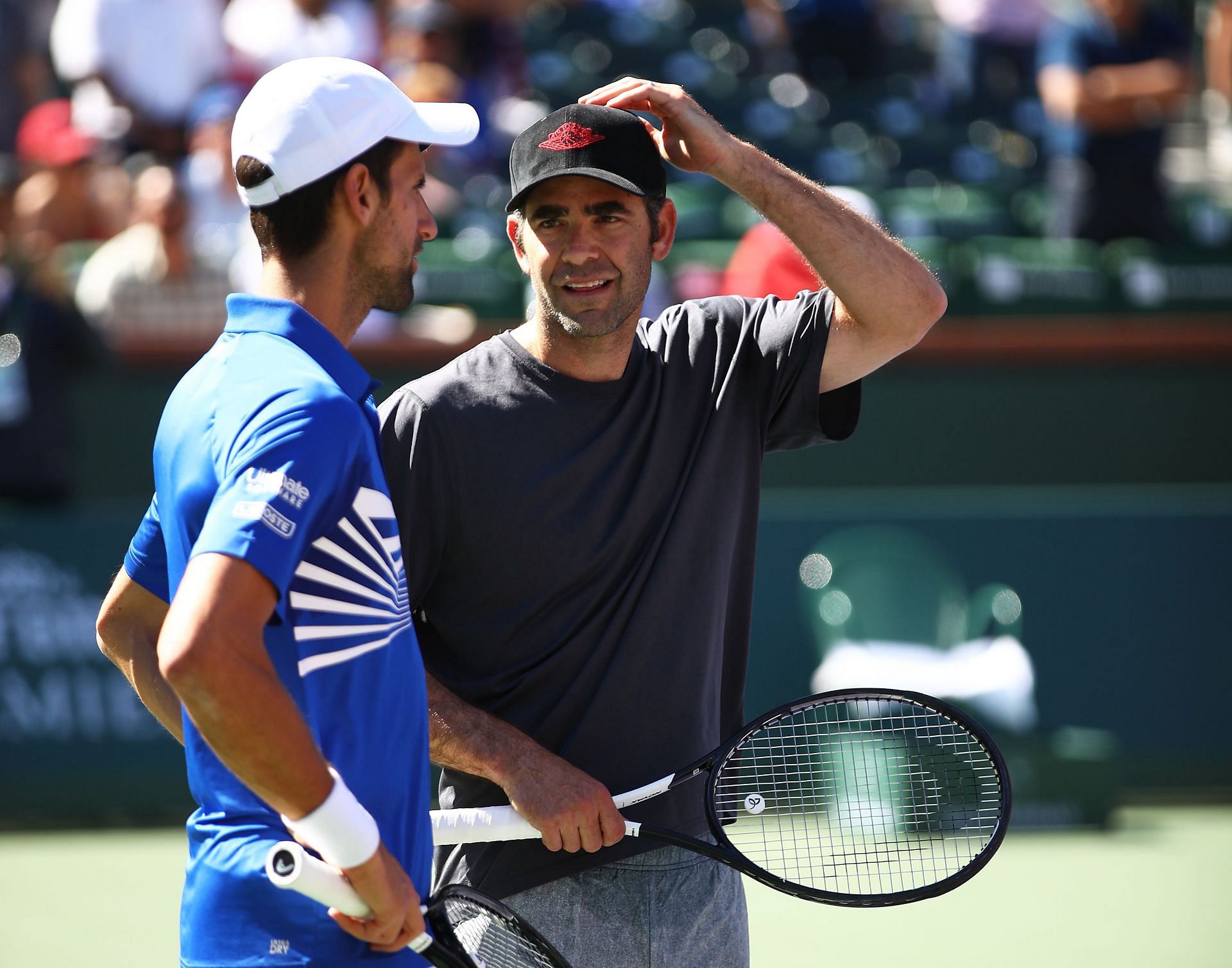Novak Djokovic (L) and Pete Sampras