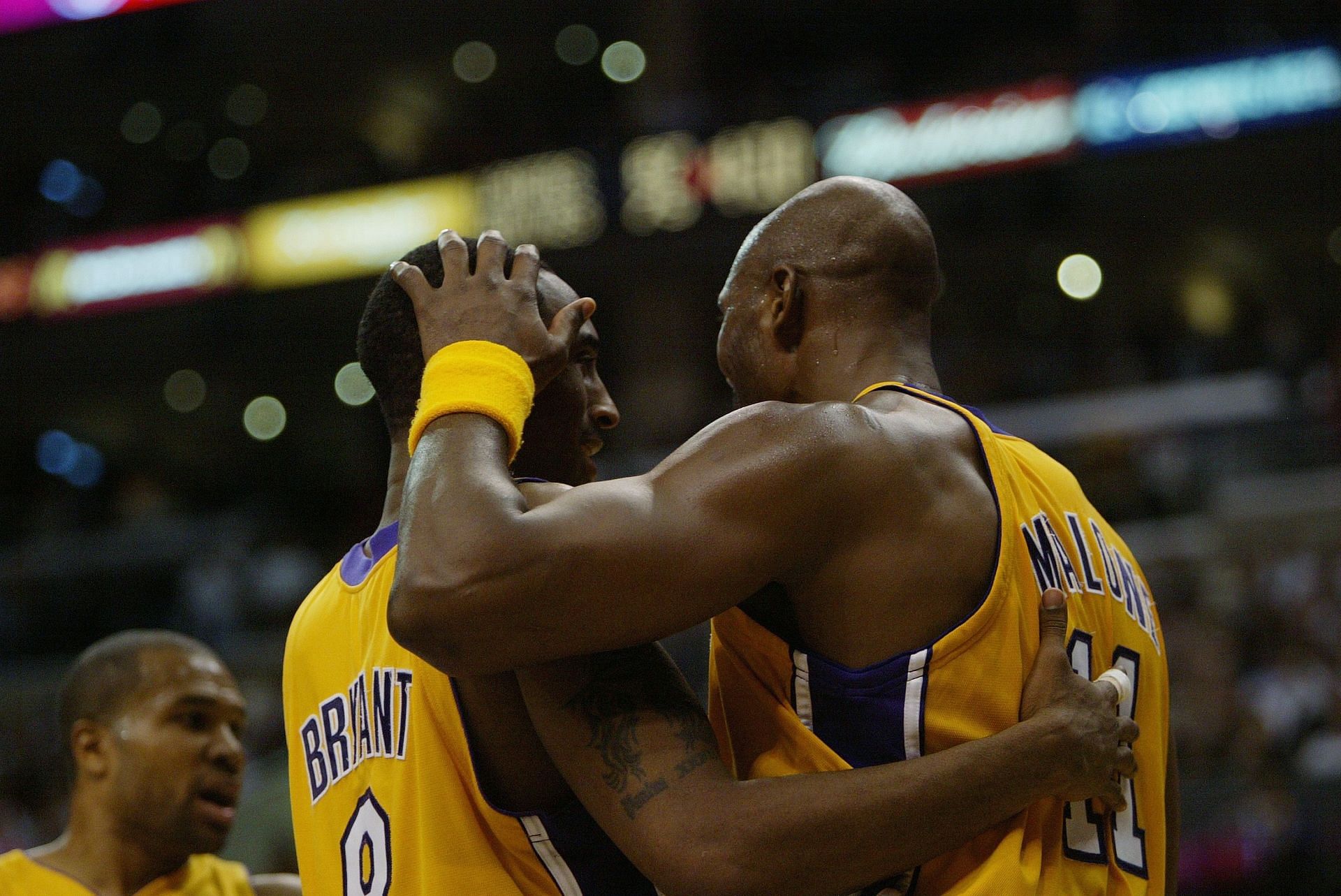 Karl Malone, right, and Kobe Bryant