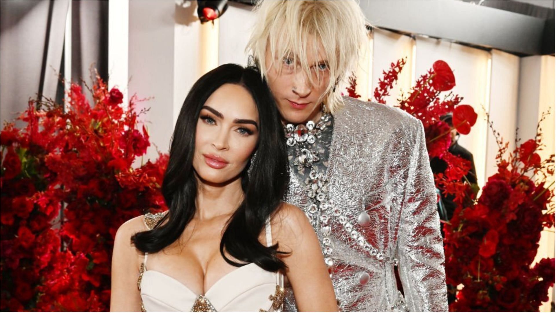 Megan Fox and Machine Gun Kelly attend the 65th GRAMMY Awards (Image via Lester Cohen/Getty Images)