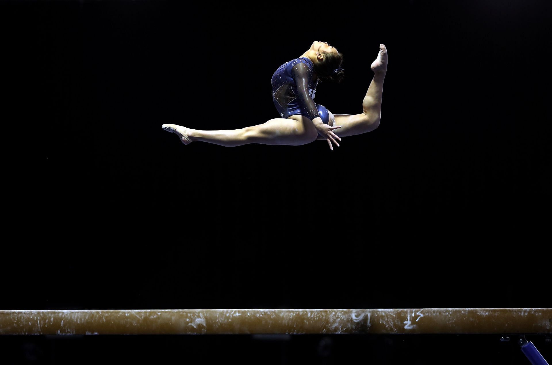 Sunisa Lee competing on the balance beam at the 2021 U.S. Senior Women&#039;s Winter Cup