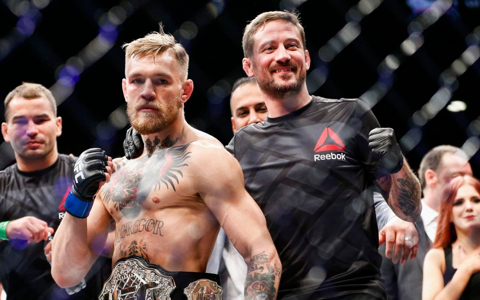Conor McGregor (left) and John Kavanagh (right). [via Getty Images]