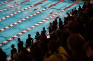 Fans watch the 200 yard backstroke during the 2022 Ivy League Womens Swimming and Diving Championships at Blodgett Pool on February 19, 2022 in Cambridge, Massachusetts. (Photo by Kathryn Riley/Getty Images)