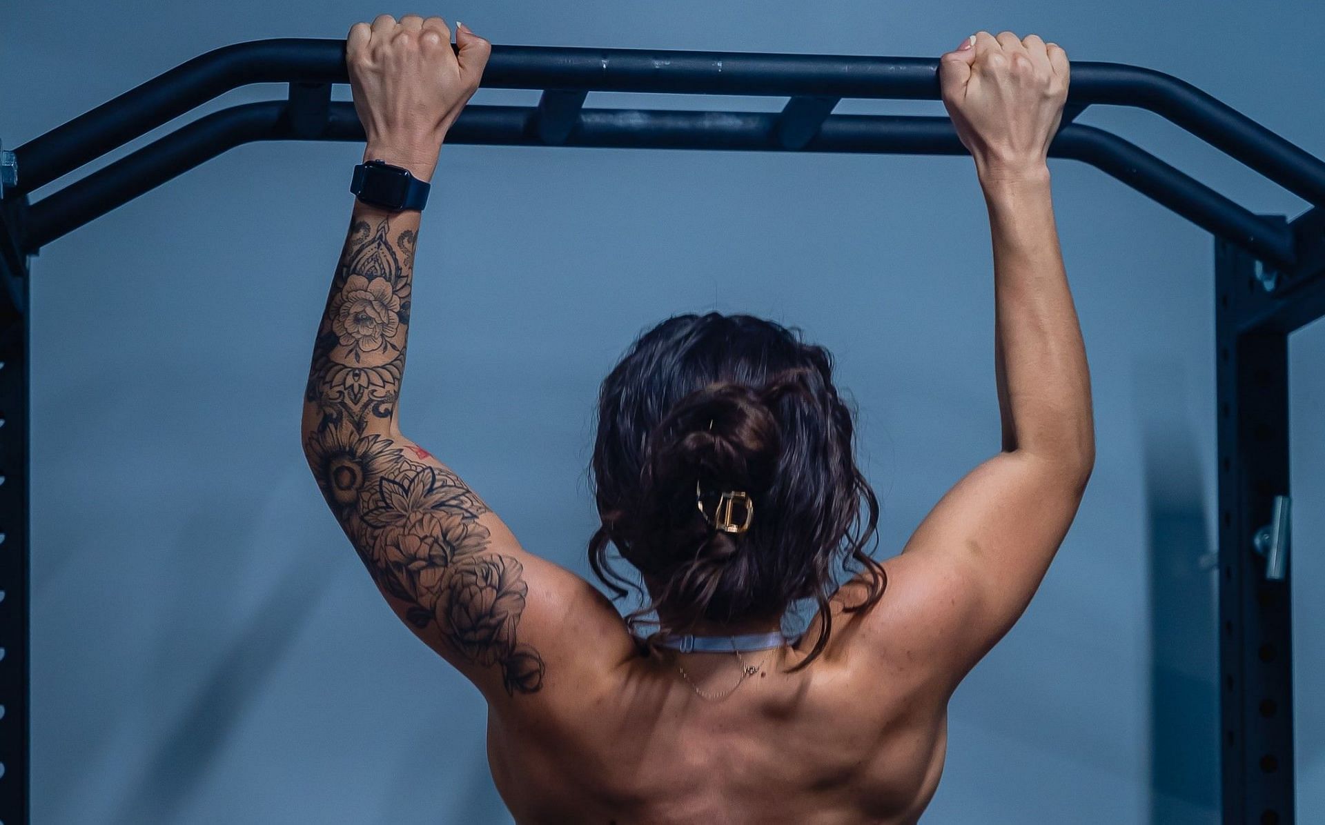 Dead hangs are a simple pull-up variation (Photo by Duren Williams/pexels)