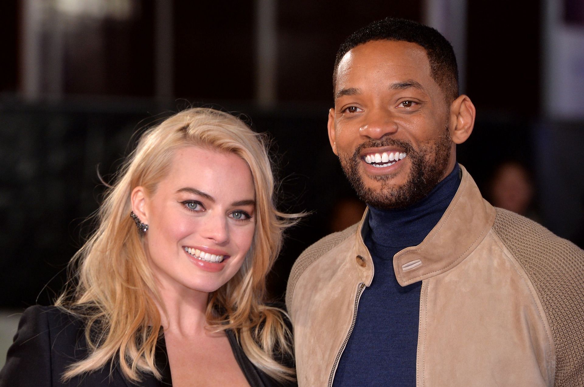 Will Smith and Margot Robbie bus video leaves netizens enraged (Image via Getty Images)