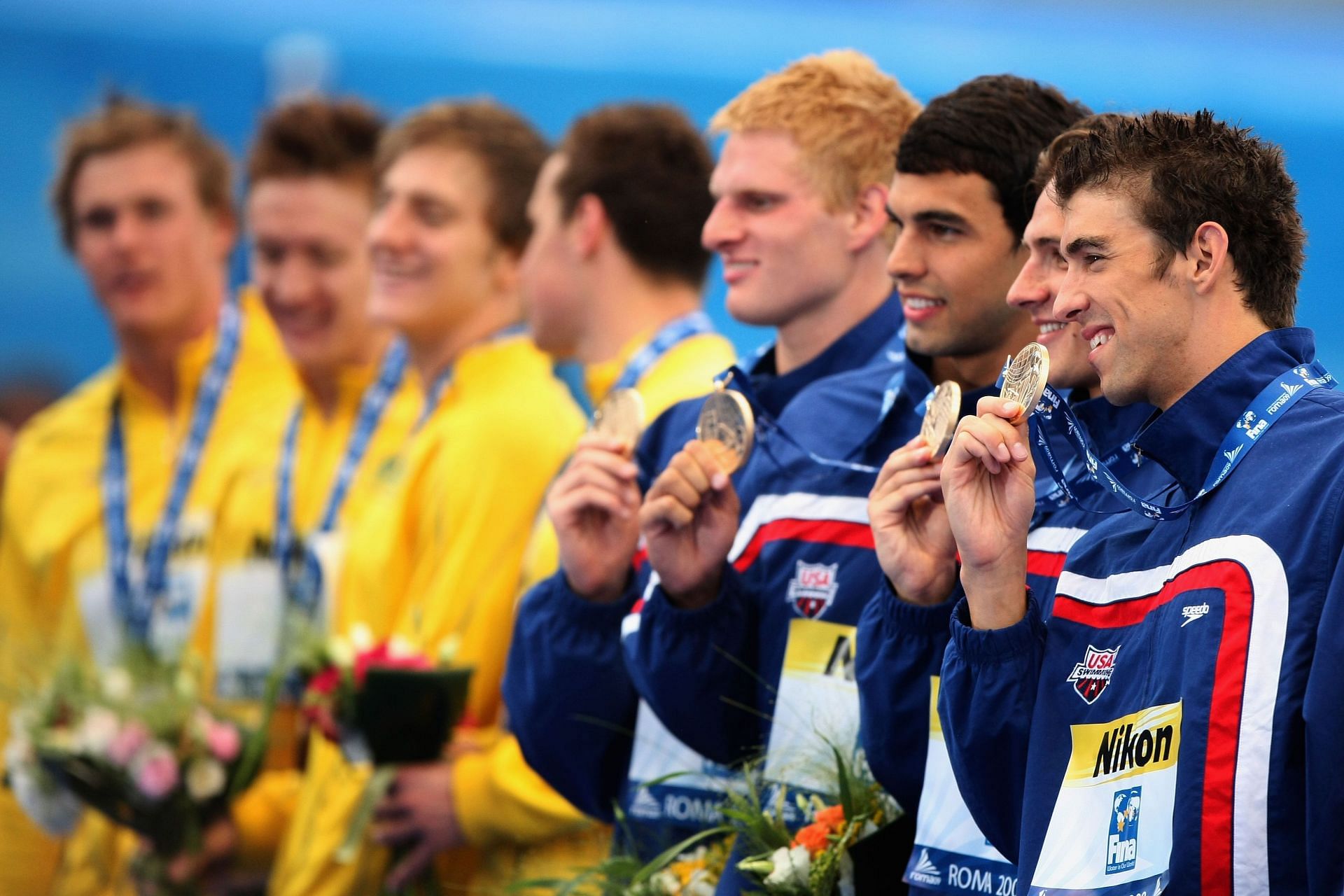 David Walters, Ricky Berens, Ryan Lochte, and Michael Phelps of the United States receive the gold medal during the medal ceremony for the Men's 4x 200m Freestyle Final at the 13th FINA World Championships at the Stadio del Nuoto on July 31, 2009, in Rome, Italy. (Photo by Al Bello/Getty Images)