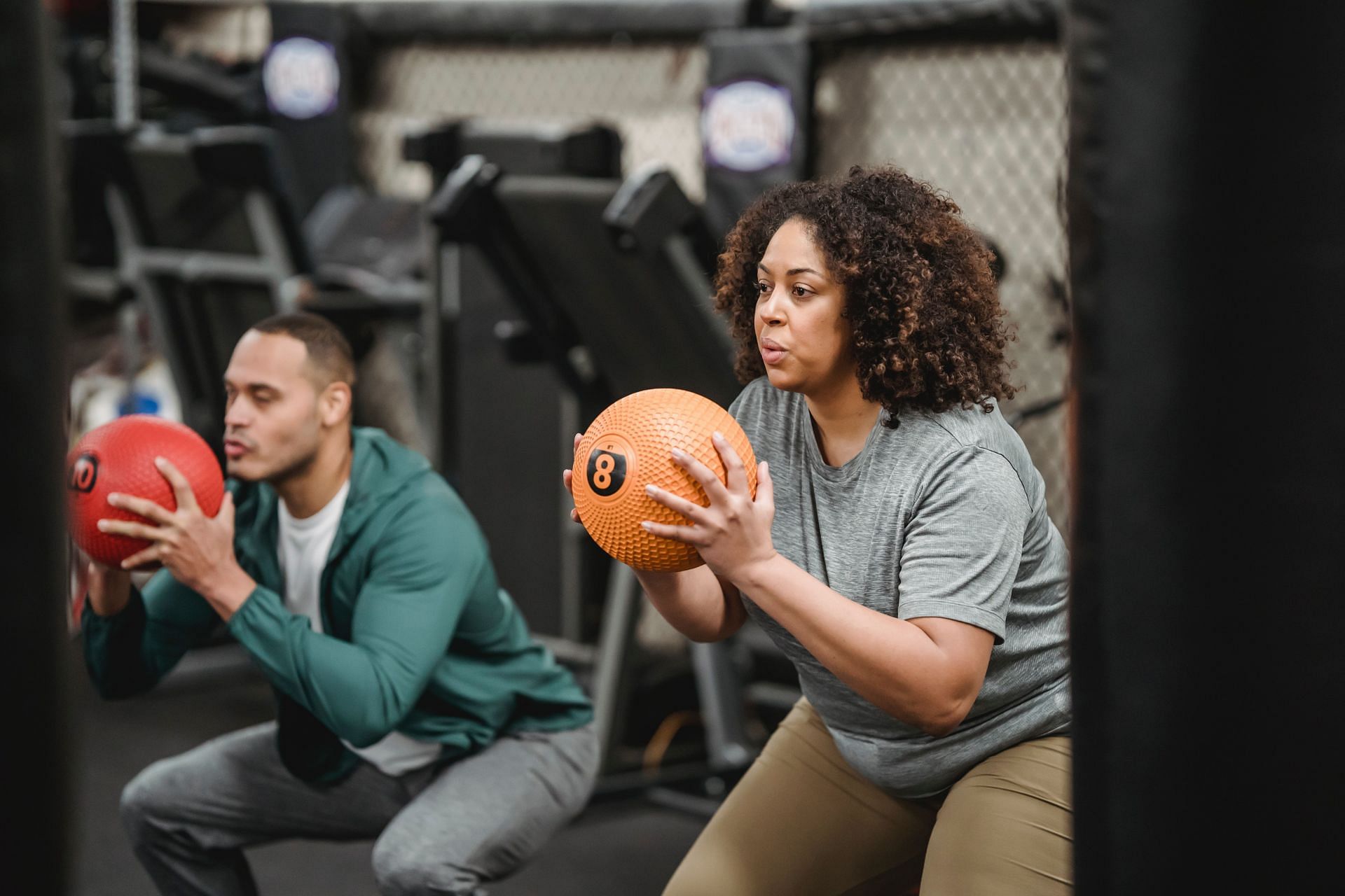 The goblet squat also engages your upper body muscles, including your chest, triceps, and shoulders, as they help to stabilize the weight. (Photo by Julia Larson/pexels)