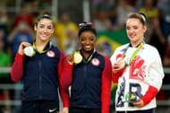 Alexandra Raisman (Silver), Simone Biles (Gold), and Amy Tinkler (Bronze) on the podium at the medal ceremony for the Women's Floor at 2016 Rio Games