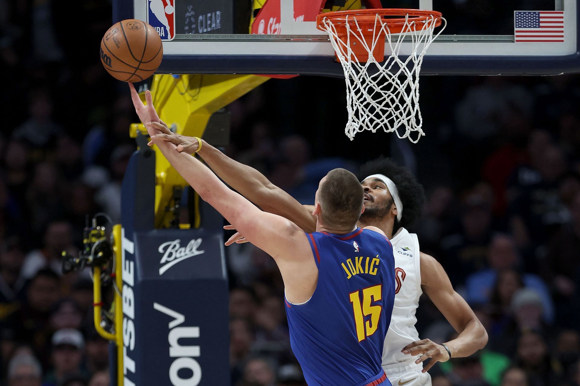 Reigning back-to-back MVP Nikola Jokic (left) goes up against Cleveland Cavaliers' Jarrett Allen