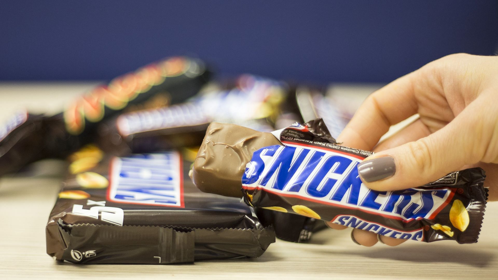 iMars Wrigley is behind multiple chocolates and confectionaries including M&amp;M&#039;s, Snickers, Mars, and more (Image via Anadolu Agency/Getty Images)