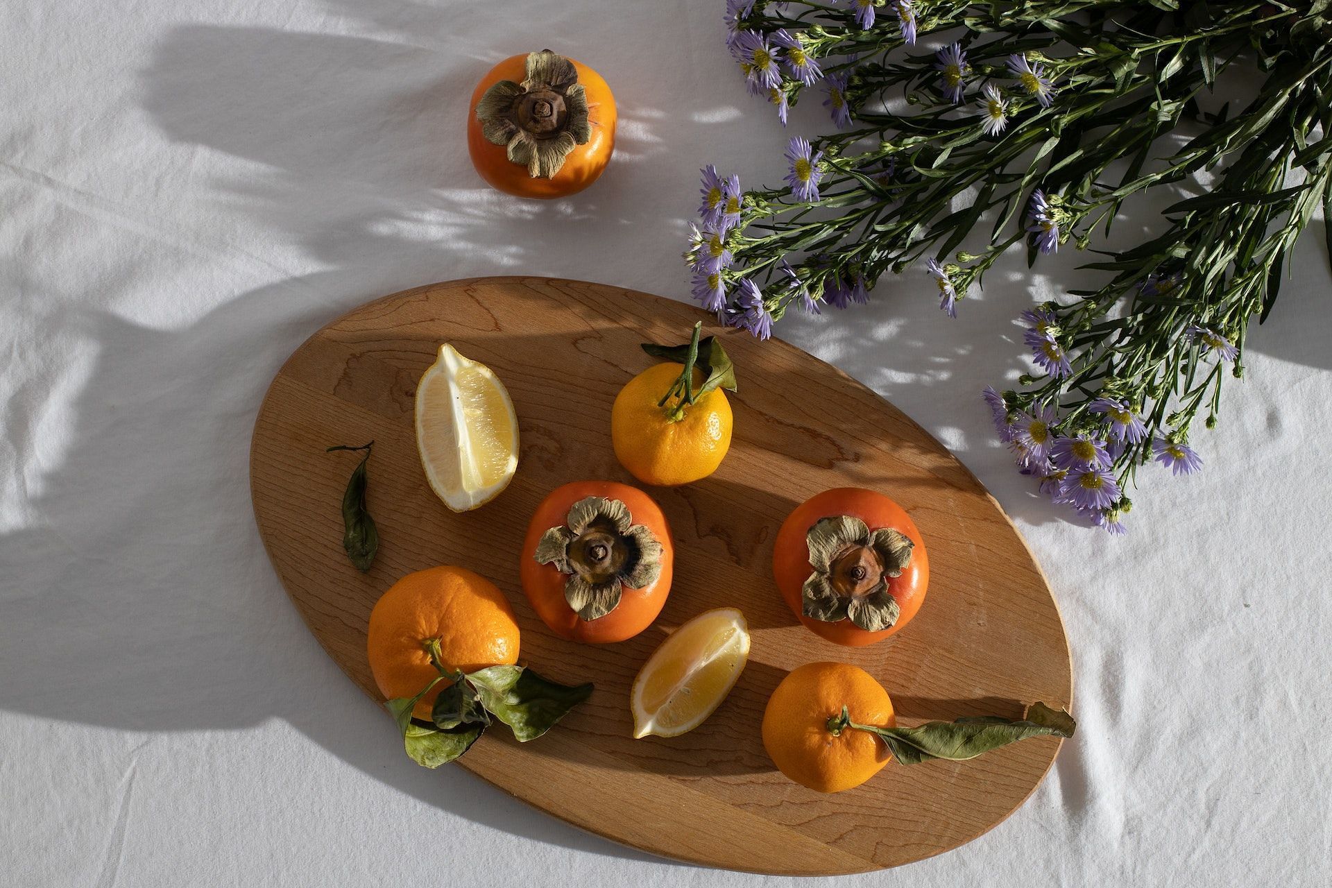 Persimmons are packed with nutrients. (Photo via Pexels/Jill Burrow)