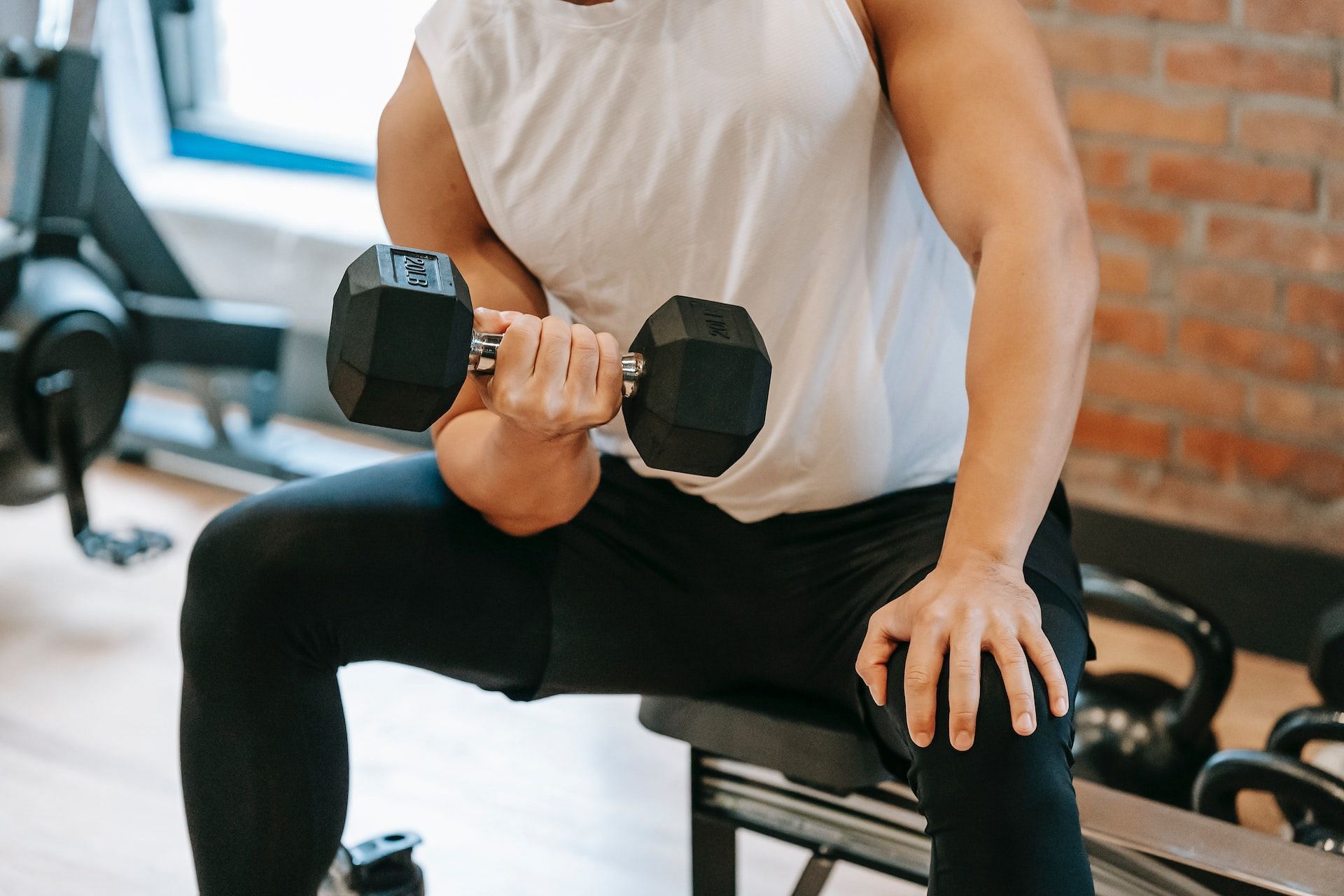 Biceps workout at home is an effective way to train your arms. (Photo via Pexels/Andres Ayrton)