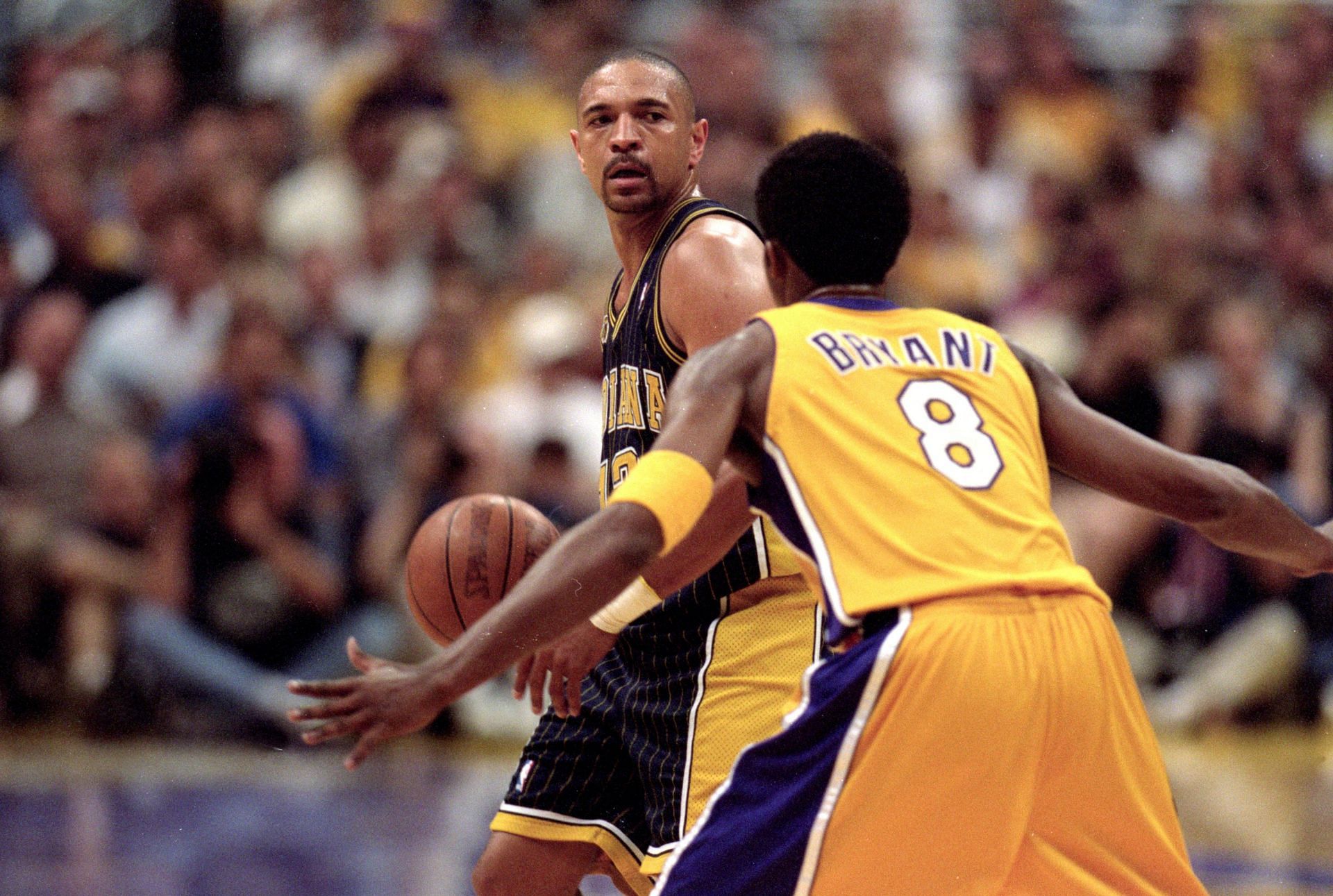 Mark Jackson playing against Kobe Bryant in the NBA Finals.