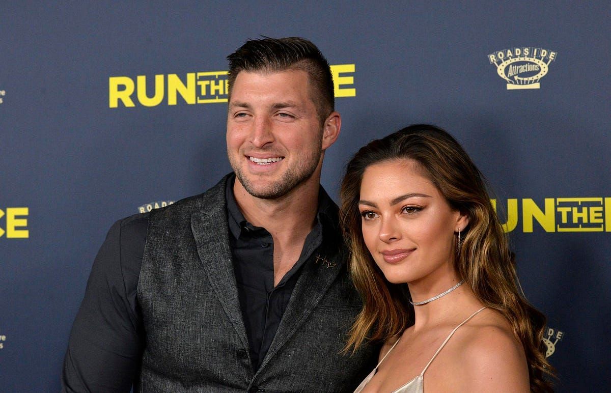 Tim Tebow, left, and Demi-Leigh Tebow