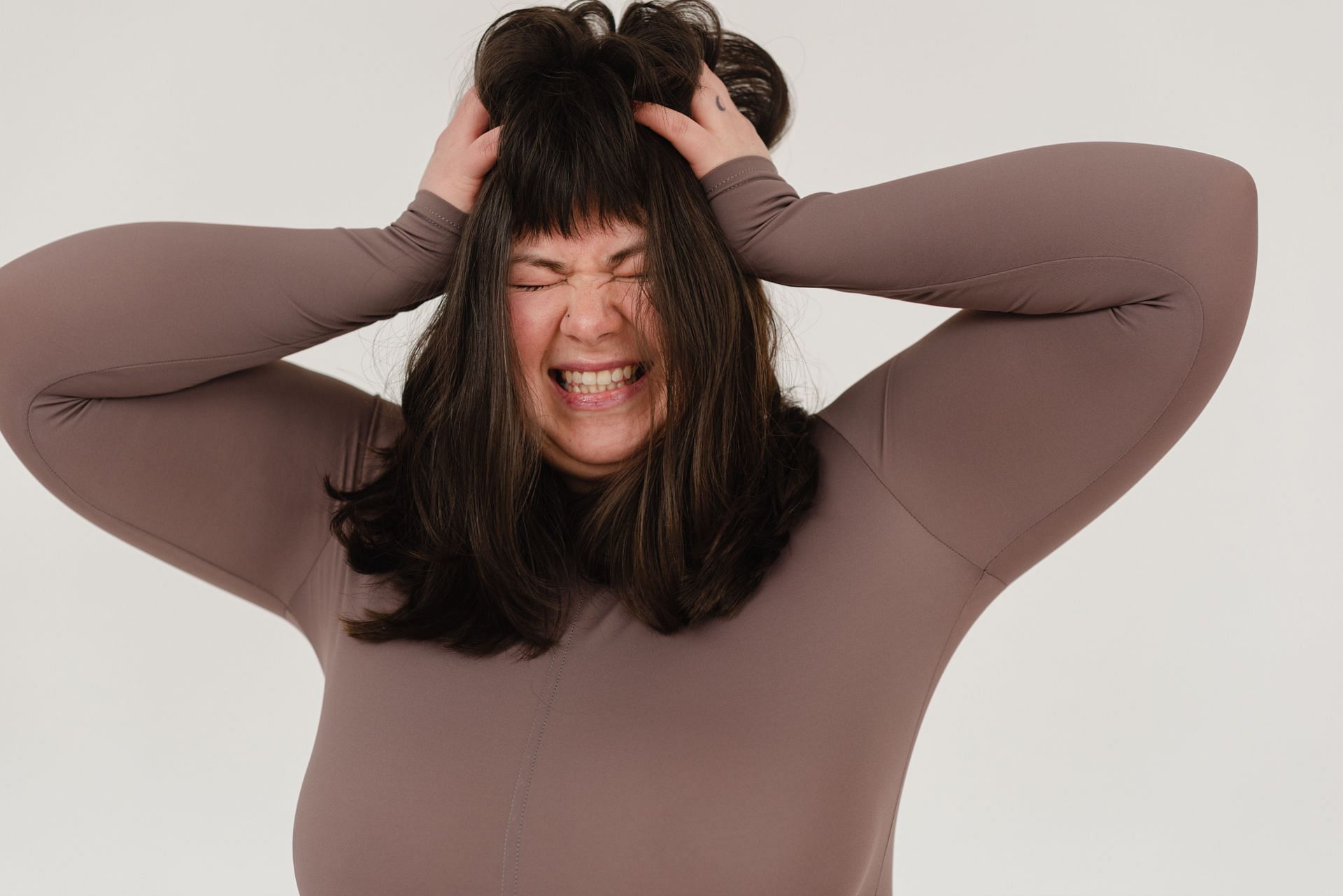 Hormonal imbalances in women can cause unwanted weight gain and hairfall issues among others (Image via Pexels @Shvets Production)