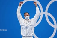Gold medalist Caeleb Dressel of Team United States poses with the gold medal for the Men's 50m Freestyle Final on day nine of the Tokyo 2020 Olympic Games at Tokyo Aquatics Centre on August 01, 2021 in Tokyo, Japan. (Photo by Maddie Meyer/Getty Images)