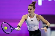 Sakkari strikes the ball at the Qatar Total Energies Open