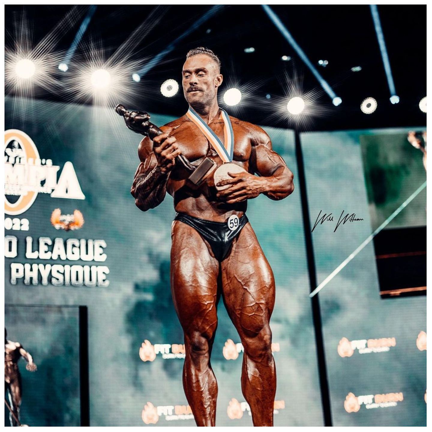 Chris Bumstead poses with his medal and trophy after winning the 2022 Men&#039;s Classic Physique Olympia (Image via Instagram (@cbum)