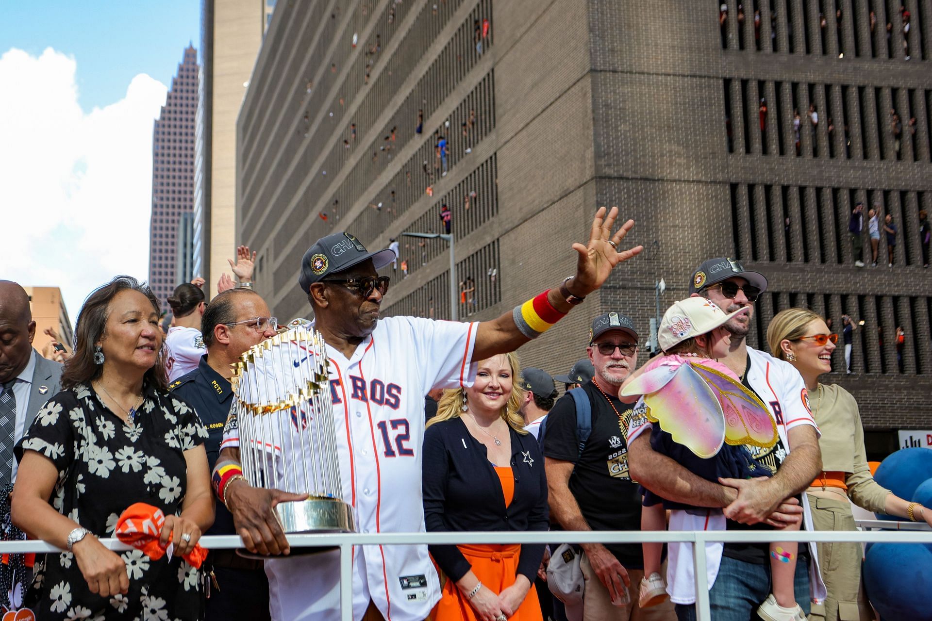 Houston Astros manager Dusty Baker holds the #WorldSeries championship  trophy during the victory parade in Downtown #Houston…